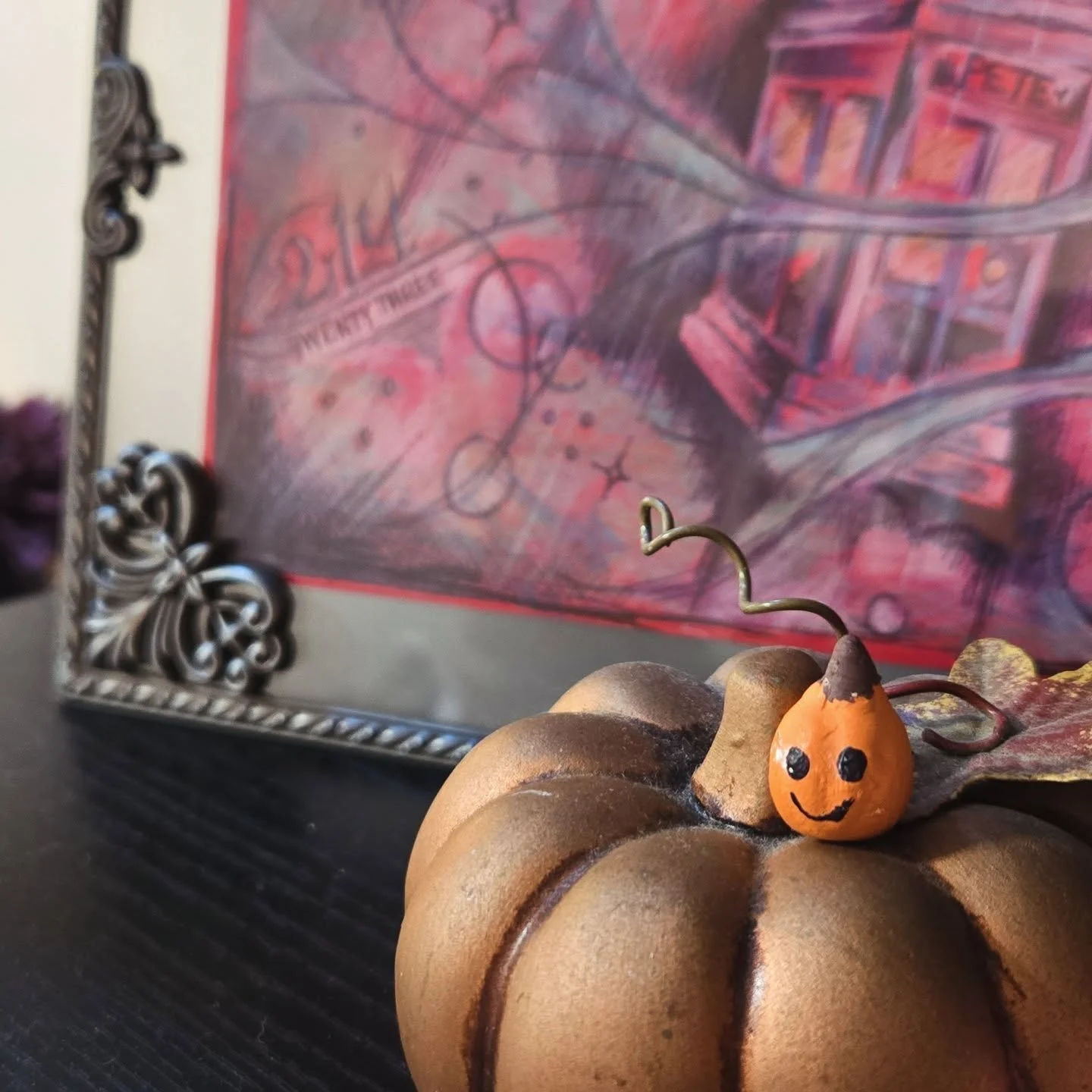My daughter was the last one to use our paint bins, and I found this little fella just chillin under the brushes. She had made a pumpkin ring-dish for her art teacher (we love her) and I guess he had a miniature friend. I've created a delightfully wh