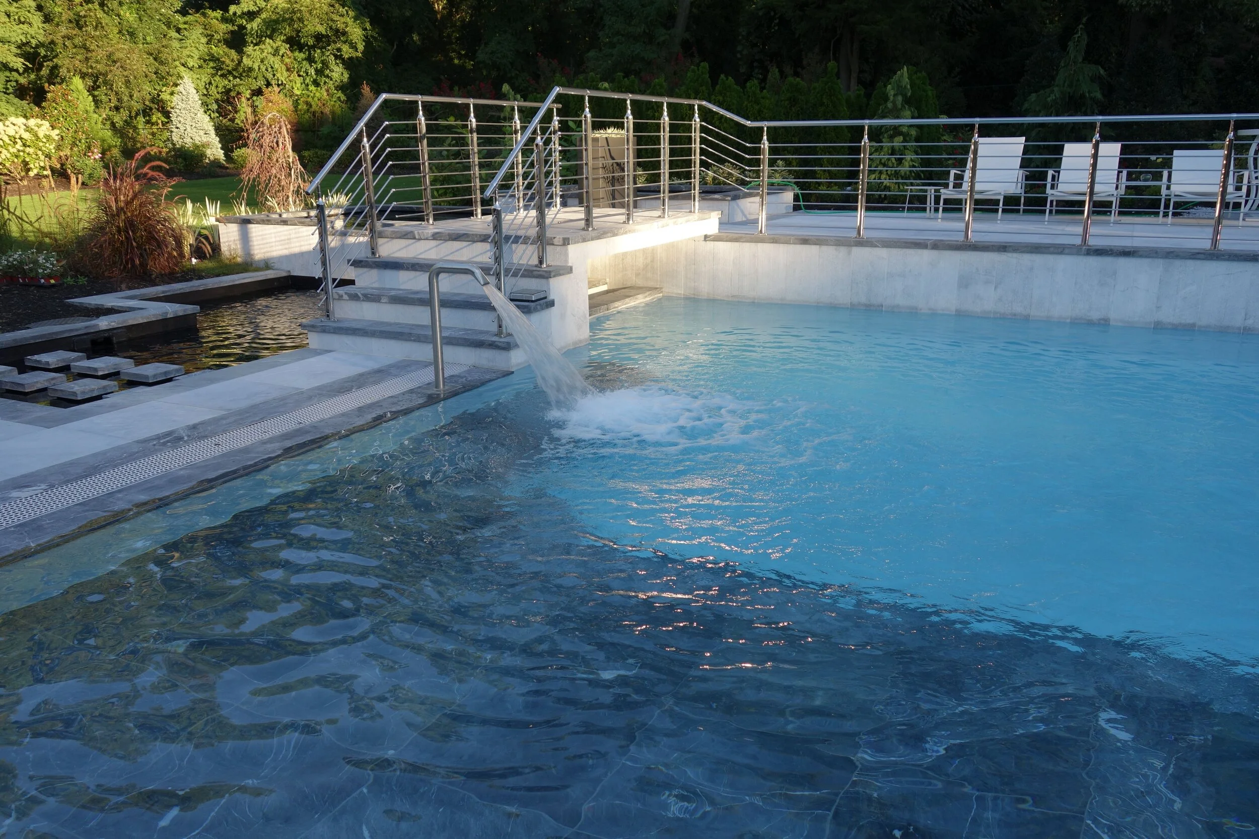 6 Tips for a More Spacious Landscape Design From a Gunite Pool Builder in Oyster Bay NY