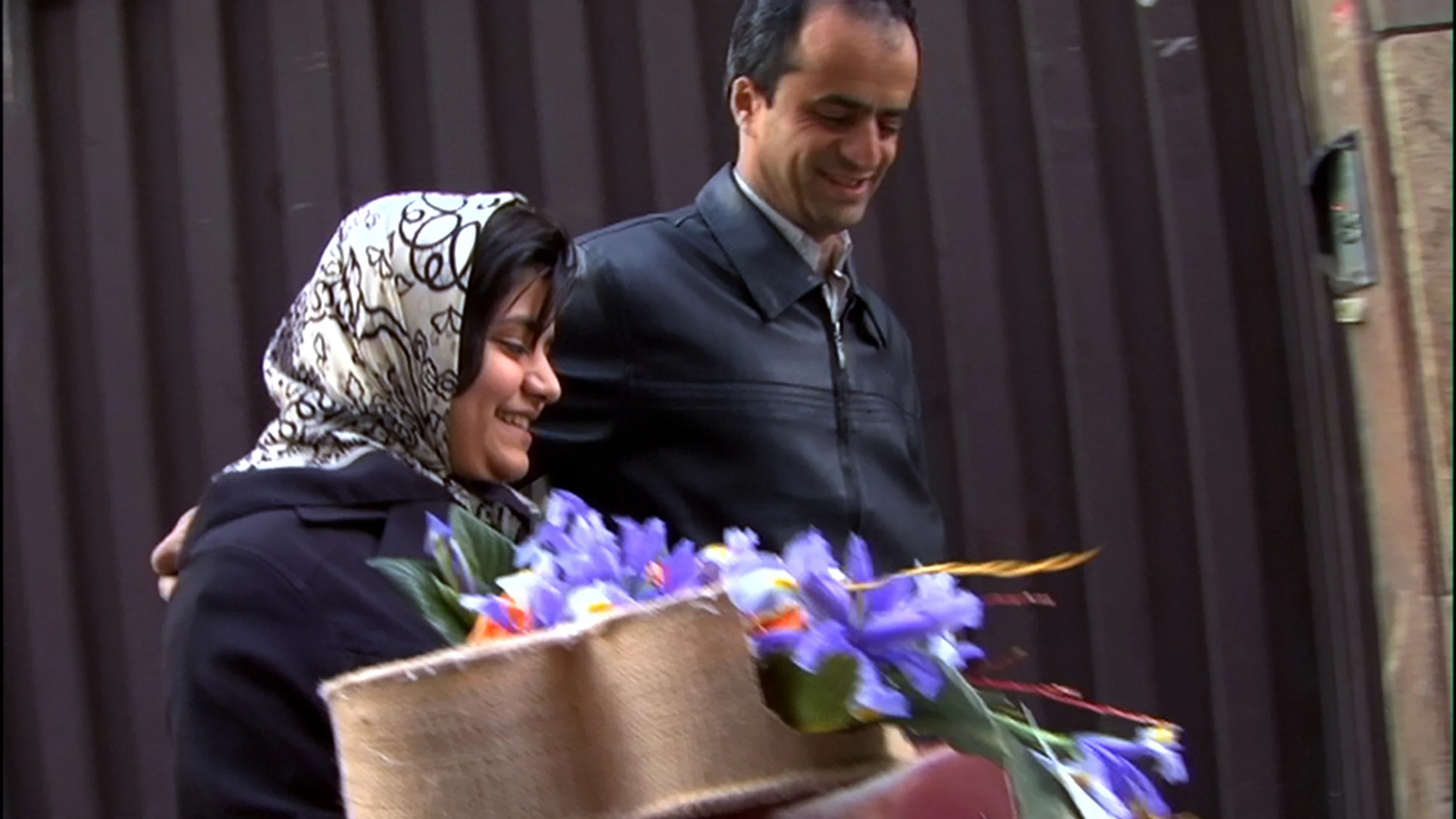 Samira and father walk home.jpg