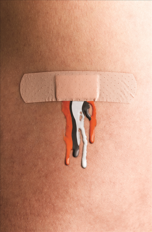 TRG Reality image of a person bleeding Cleveland Browns colors. 