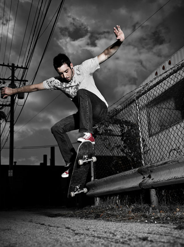 Black and white image of a skateboarder 