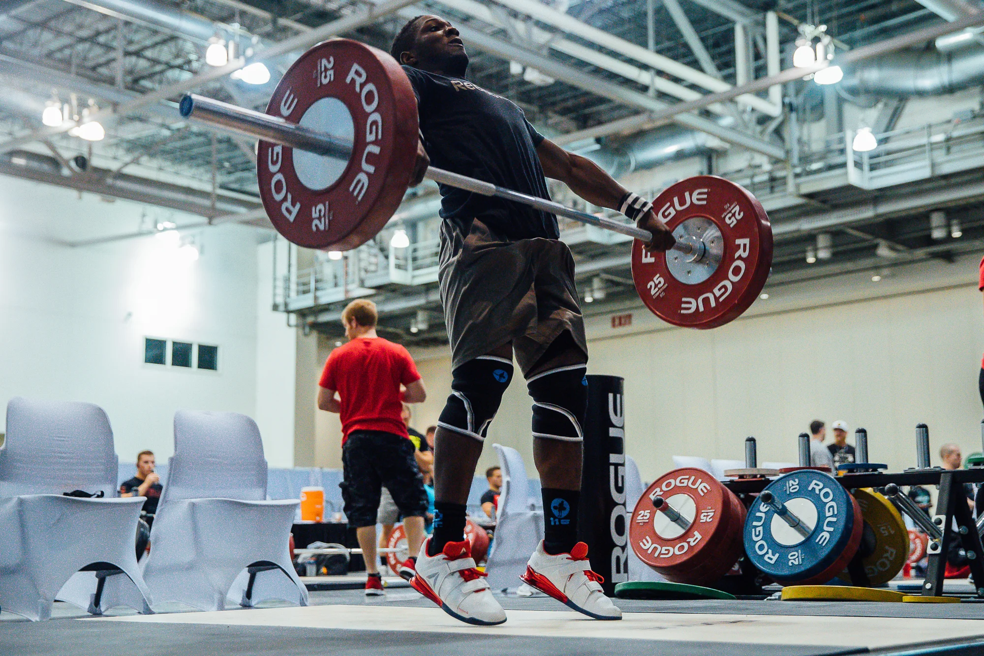 While warming up, CJ actually missed one of his snatches. As a weightlifter I stopped breathing and as a photographer I got the hell out of the way!!! I actually sent CJ a message apologizing if I had gotten to close while warming up. His response, "It's totally fine." 