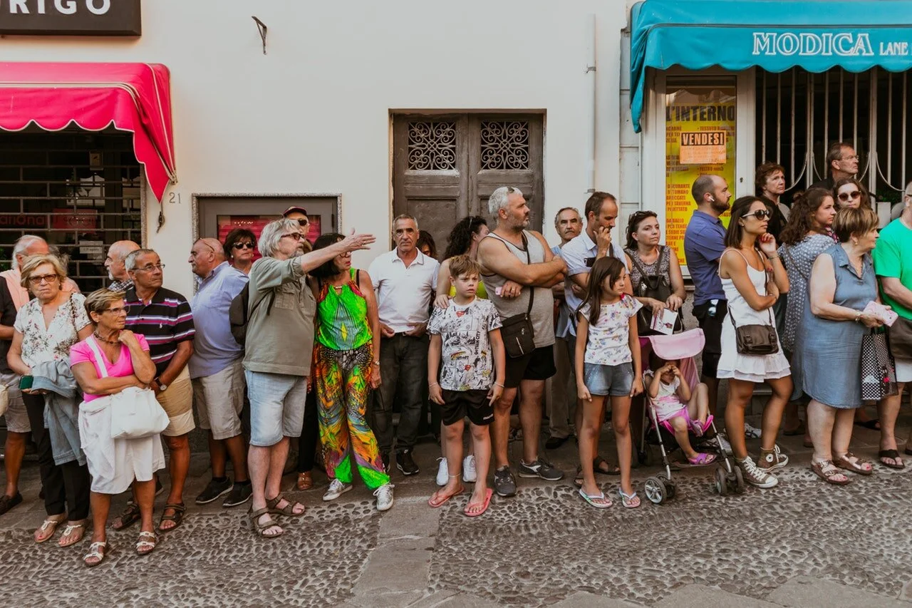 people-standing-outside-stores-2877106.jpg