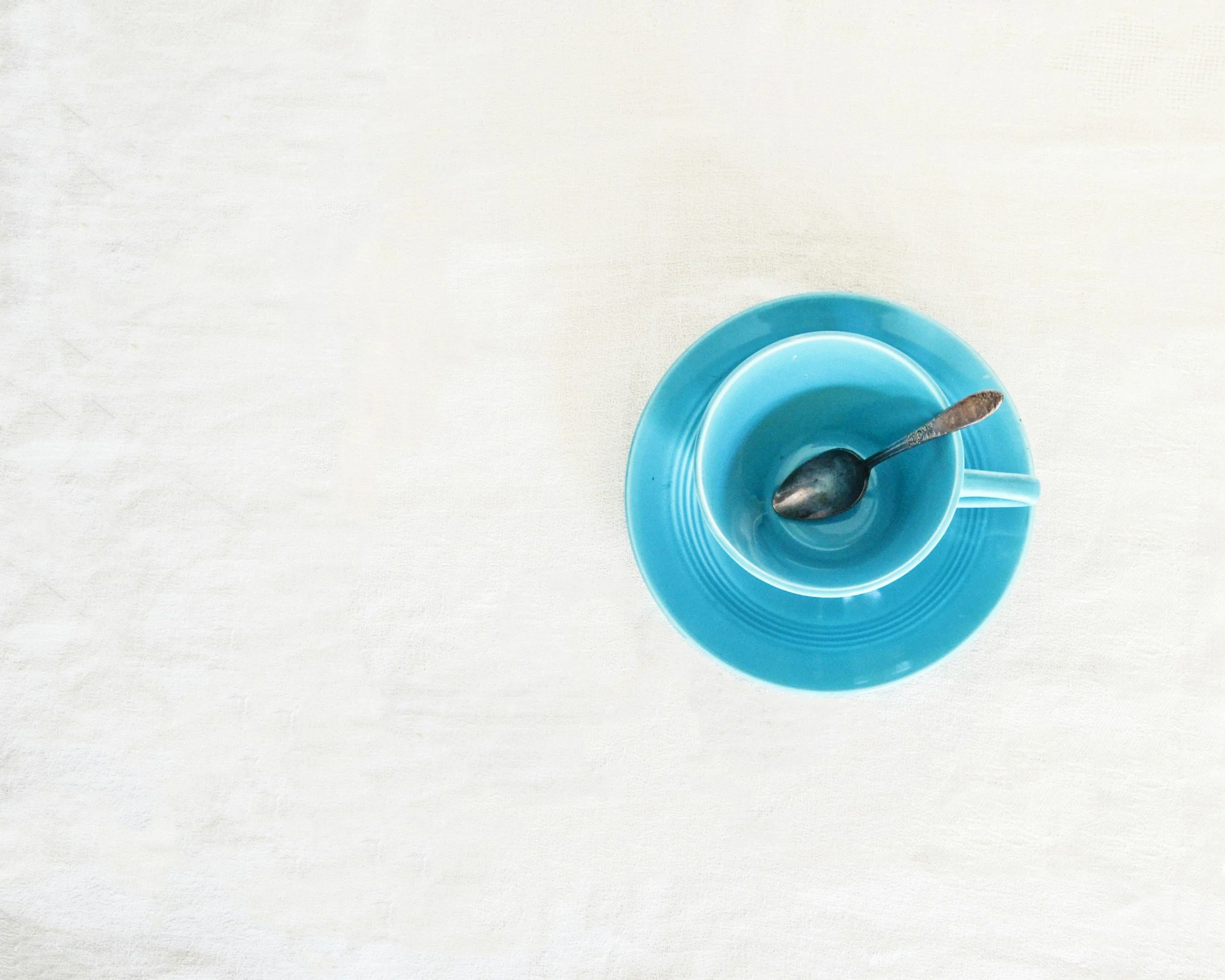 Teacup with a spoon, birdseye view
