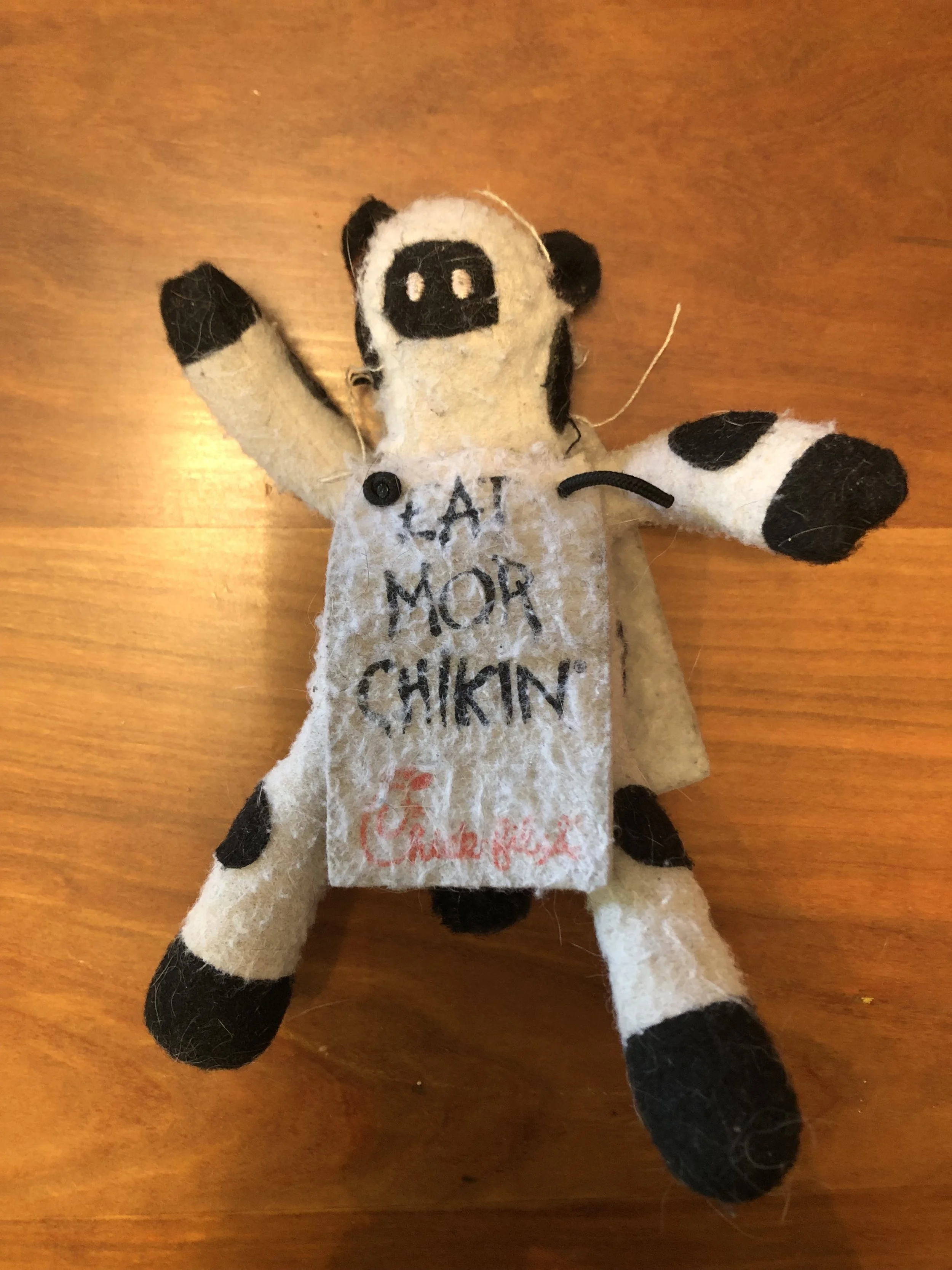 Tattered chick-fil-a cow