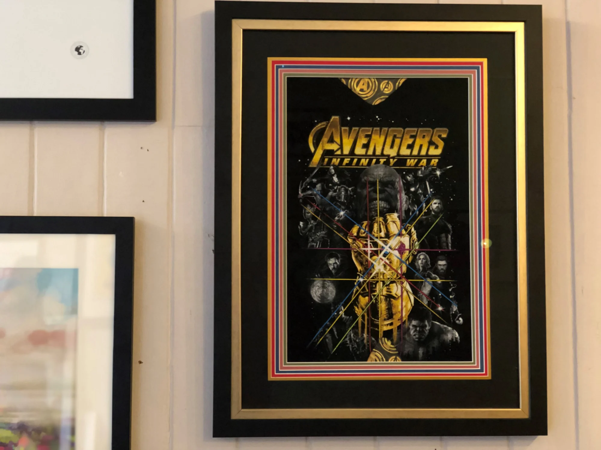 This Avengers poster is one of my all-time favourite examples of professional framing. It blew my mind when I saw this incredible piece - a work of art in itself. The team at Mimi V’s used 6 mounts - yes 6!! - each a different colour and each with a beveled white edge, adding depth to the picture. It was then double-framed to add another dimension. I love the way the gold stands out and links to the gold in the poster. What a stunning piece!