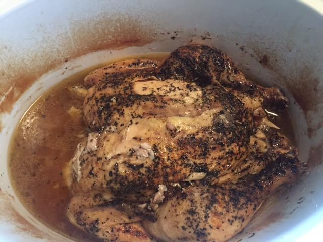 This is what my chicken looked like today after cooking for 8 hours. (I already took some of the broth out before I took this picture but the crockpot is usually filled halfway with broth!)