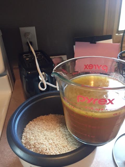 I use 2 1/2 cups of my homemade chicken broth (I mean really, how cool is that?!) for my 2 cups of rice.