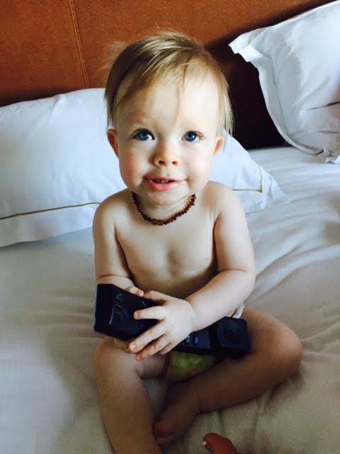 Anya Grace wearing her Amber Teething Necklace, she's had it on since she was 2 months old and we never take it off. I've noticed a big difference in her Eczema since we started wearing it. I took it off her a few times when she was smaller and saw her Eczema flare up! 