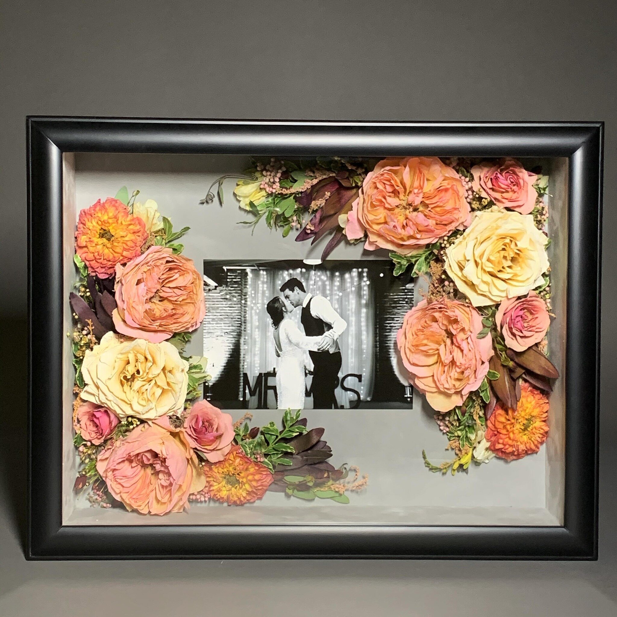 These vibrant bright flowers accenting the newlyweds fairy tale photo are beautifully coupled for an overall display 🌺