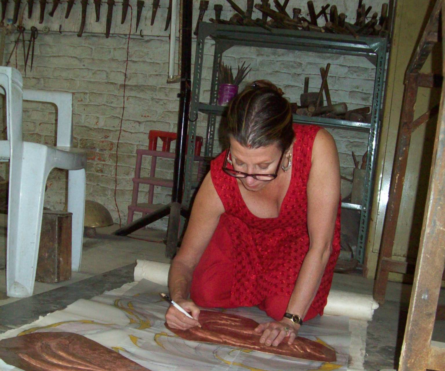 Drdak preparing repoussé for gilding at Shakya's atelier in 2012.