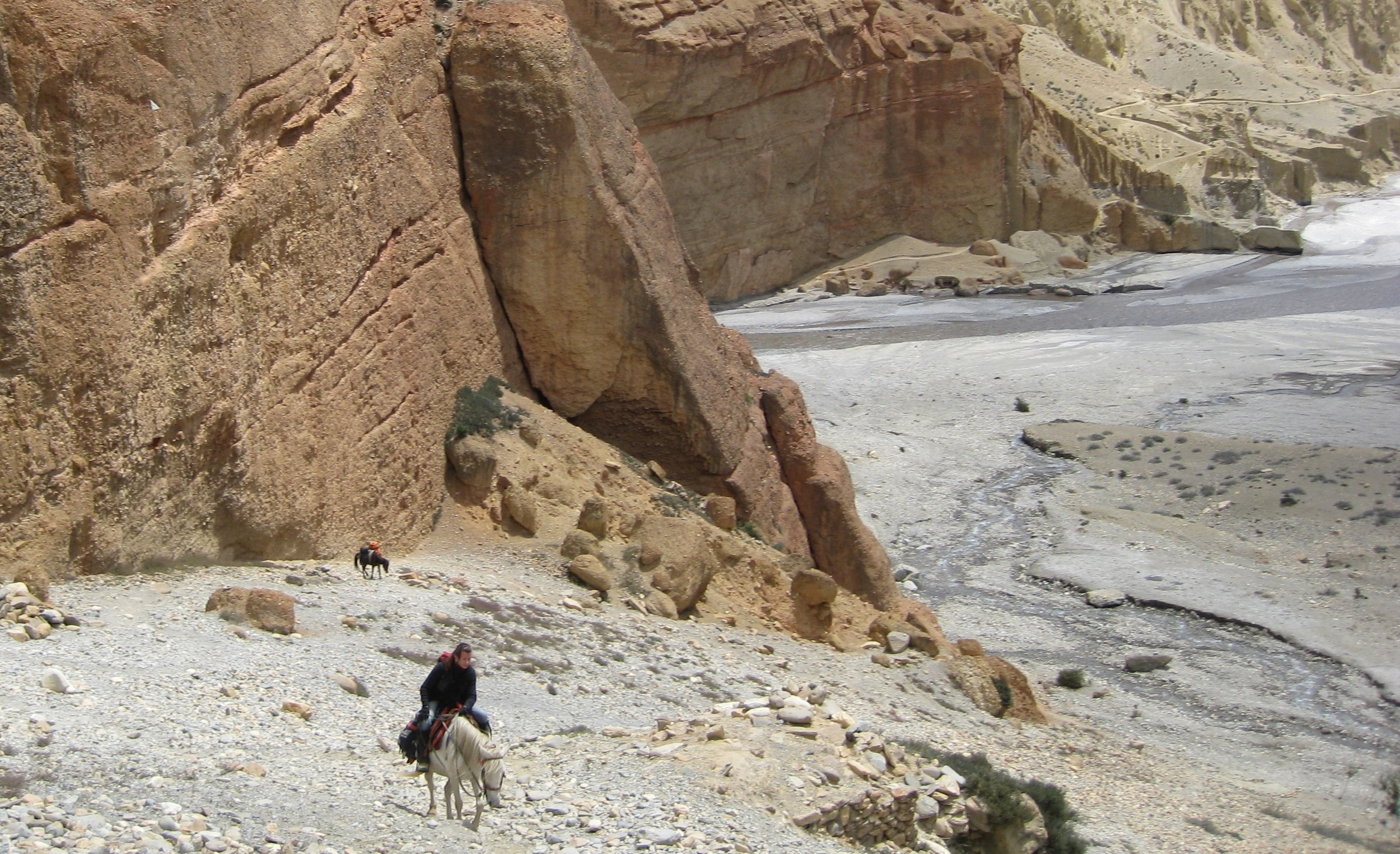 Drdak on Dolma ascending the path to Chele village near the Kali Gandaki's Mustang Gate, Upper Mustang 2008.