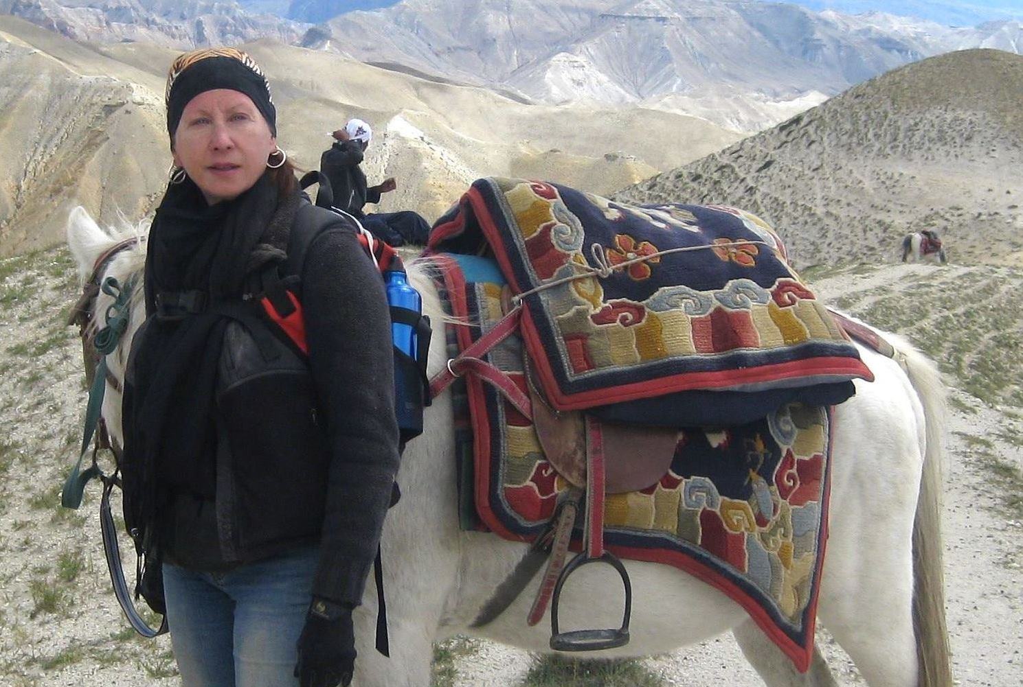 Maureen Drdak with her mare Dolma in Choser near the Tibetan border, Upper Mustang, Nepal, 2008.