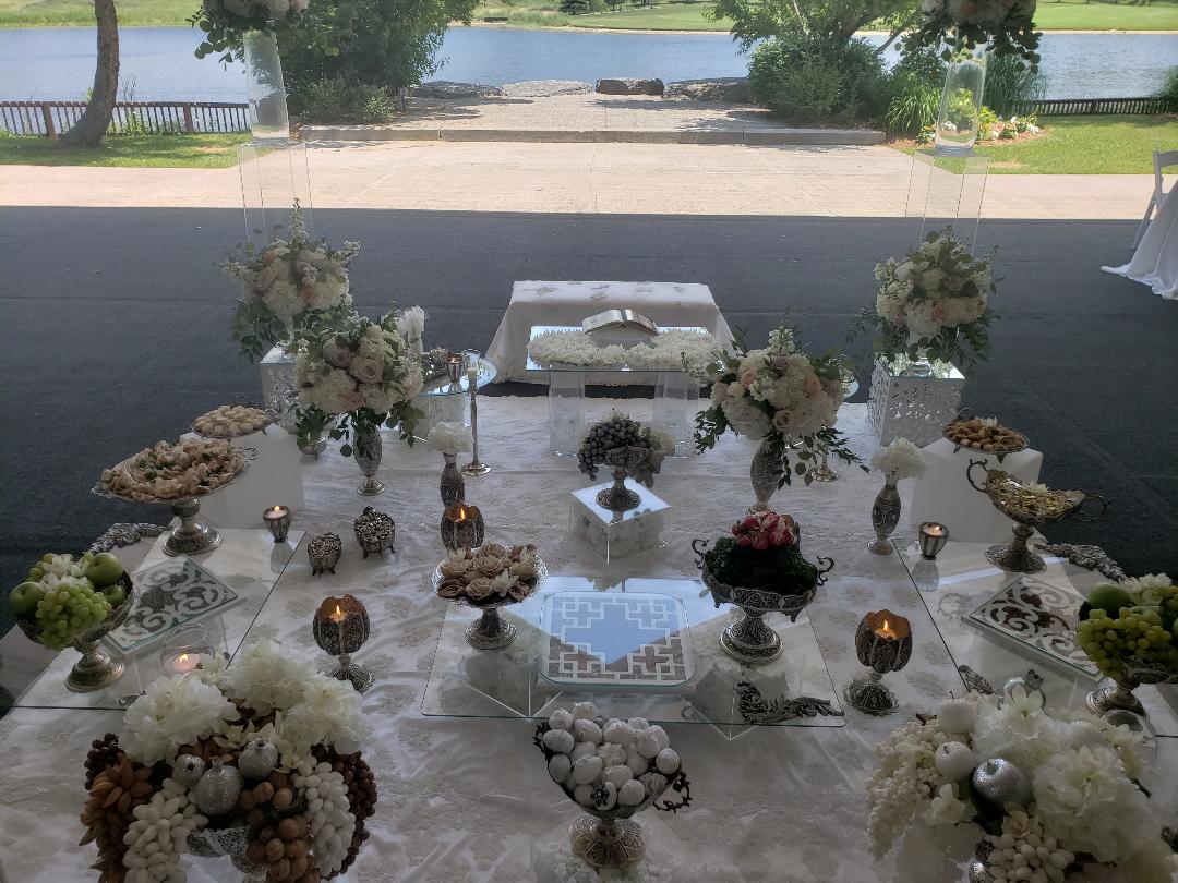 Silver Sofreh set up on Glass. The Manor, King City