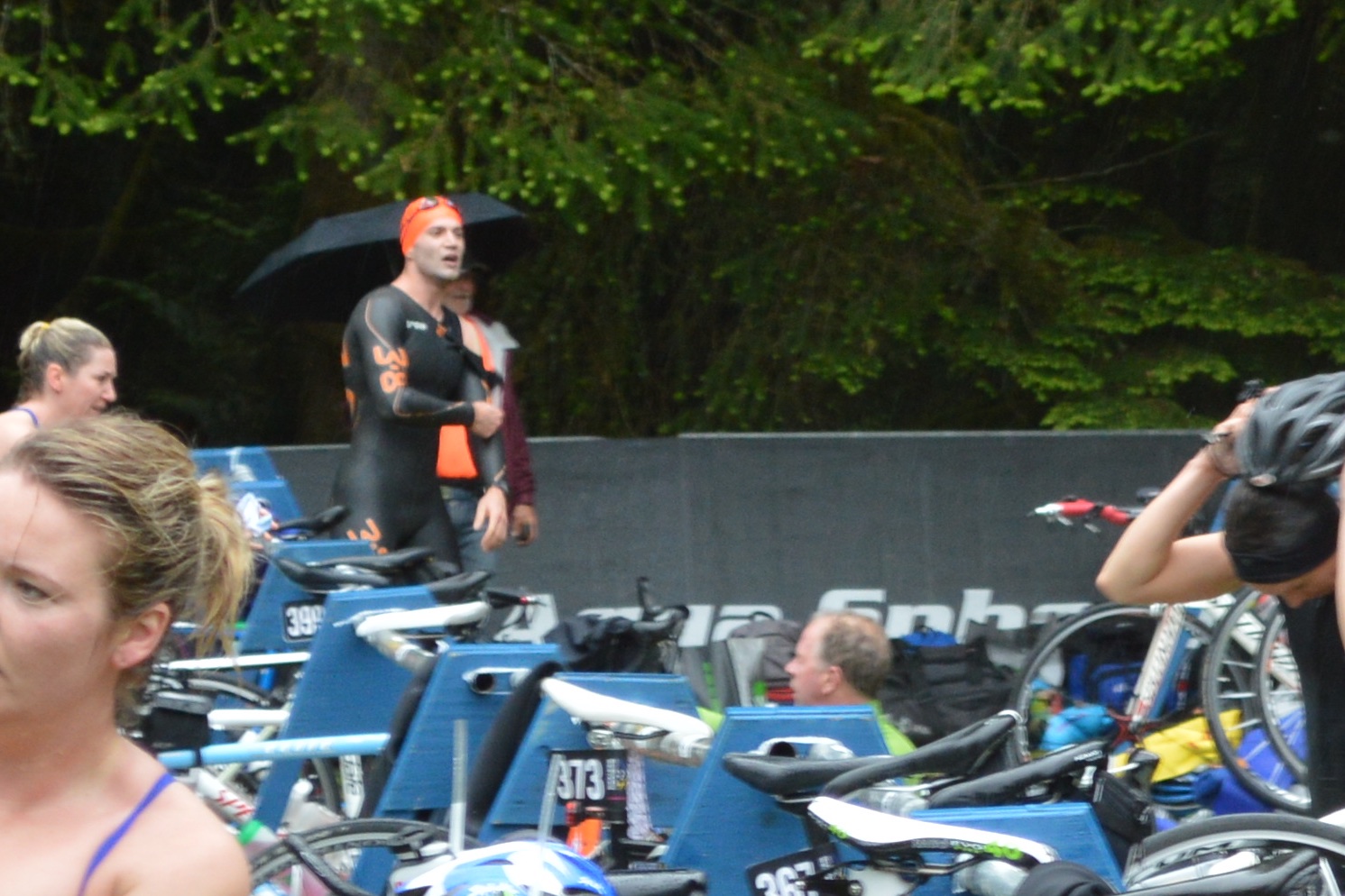Struggling to get the wetsuit off before I reach the bike!