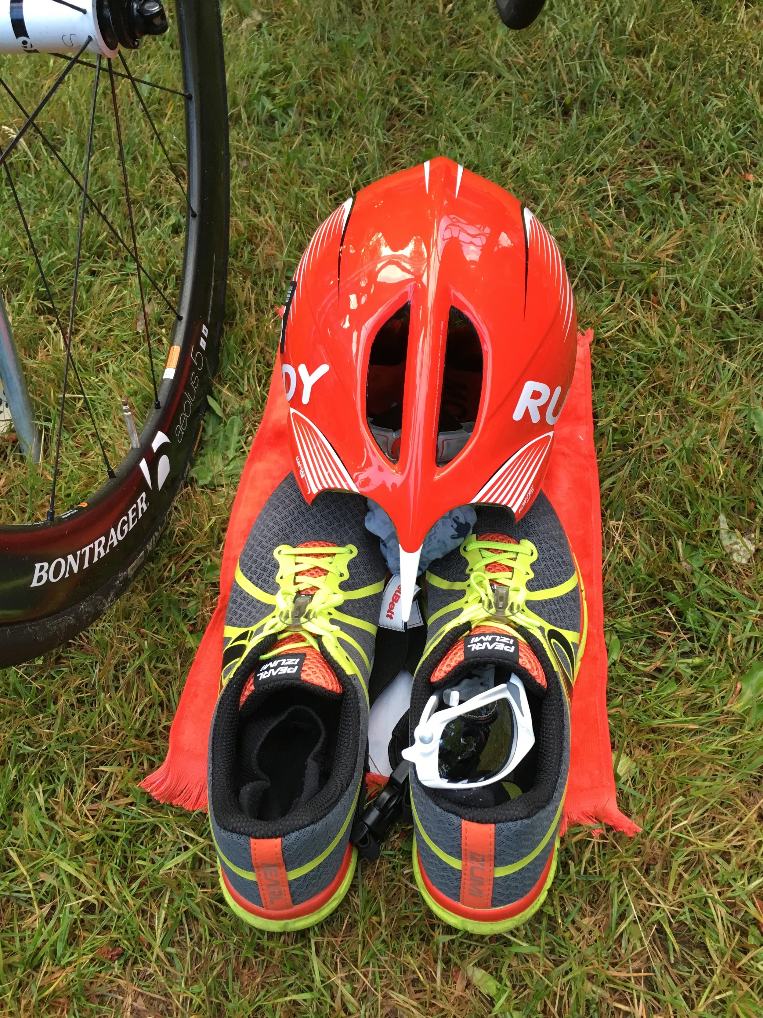 T1: wetsuit off, helmet on and go! T2: helmet off, socks + shoes on, grab race belt + sunnies and go!