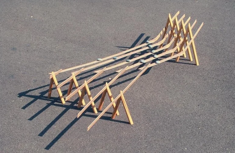 Abacus III Steel, Wood and Stones 108” x 67” x 18” 1985