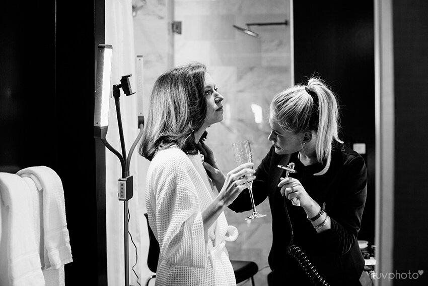  bride getting ready at the blackstone hotel in chicago getting ready before the wedding ceremony and photos 