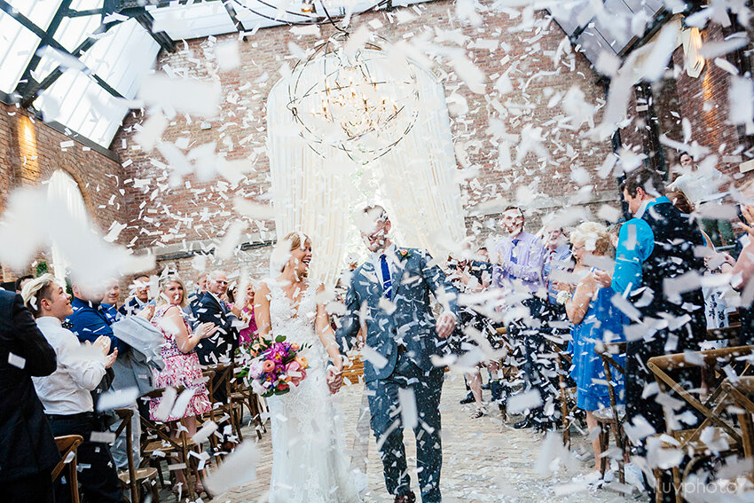  grand exit chicago wedding ceremony at bridgeport art center with confetti   