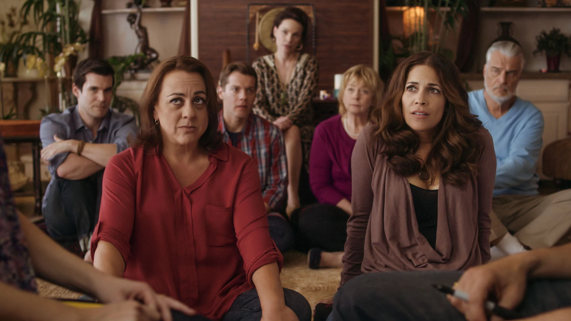 Kat (Tara Karsian) and Sam (Andrea Grano) in group therapy