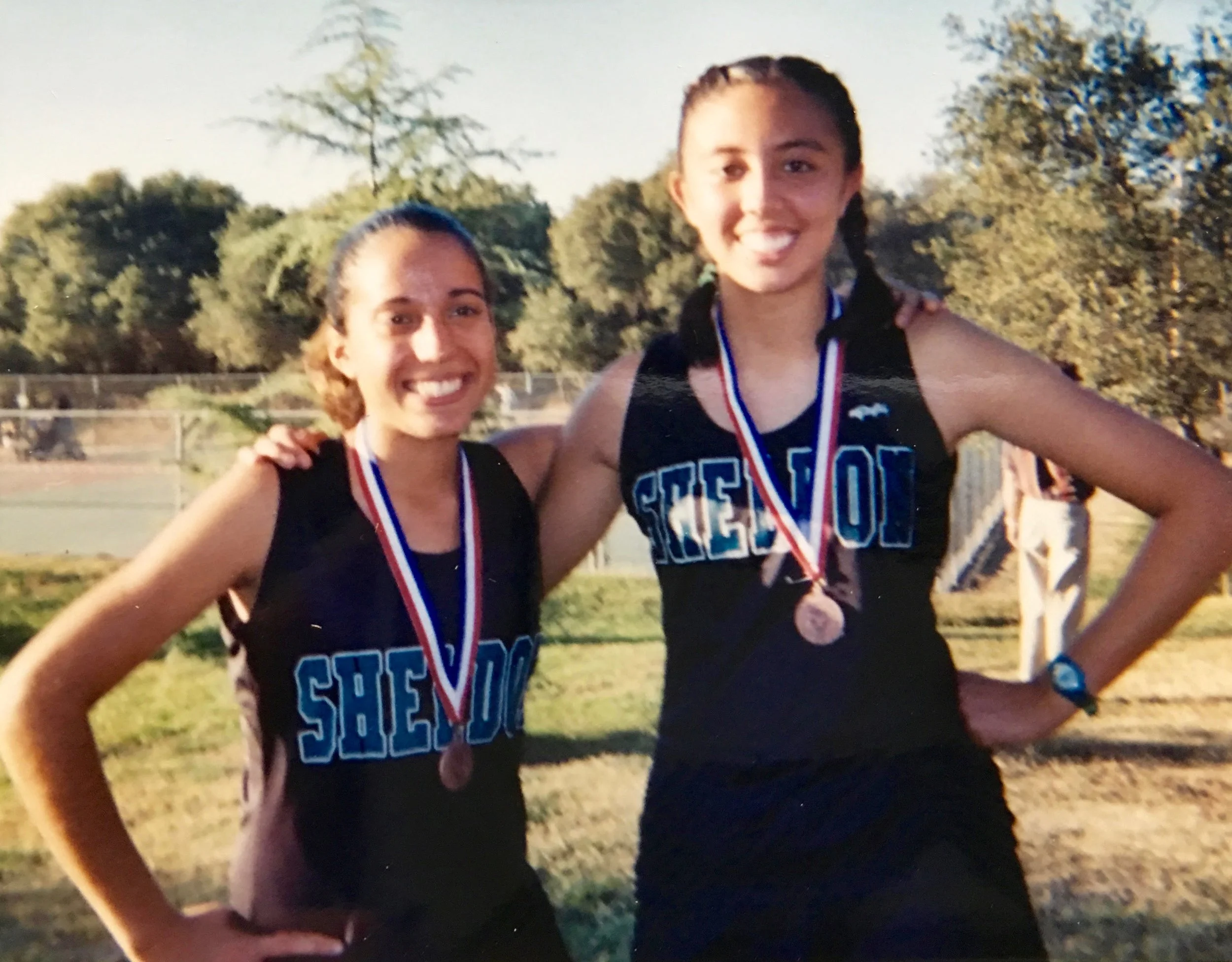 We were awarded medals when our frosh/soph cross country team won the Delta League Championship in 2003.