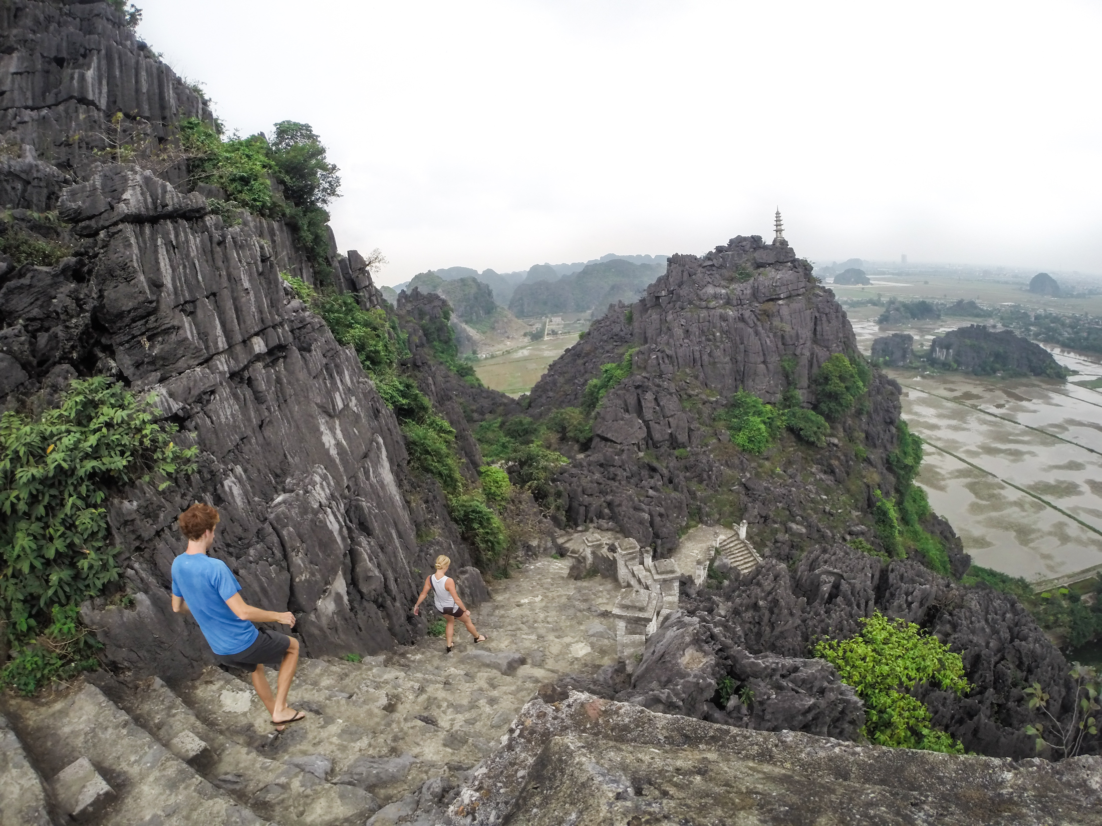 David and Kelsey Tilley on a hike in Vietnam near the Mua Caves.