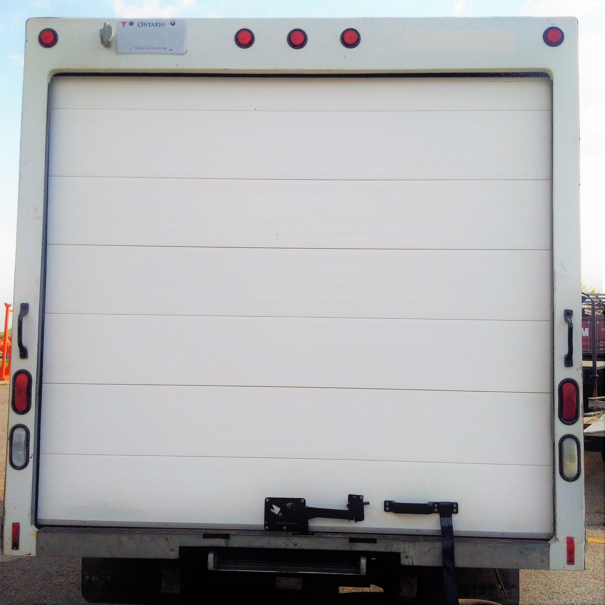 Insul-Lite insulated truck door installed on a cubevan.jpg