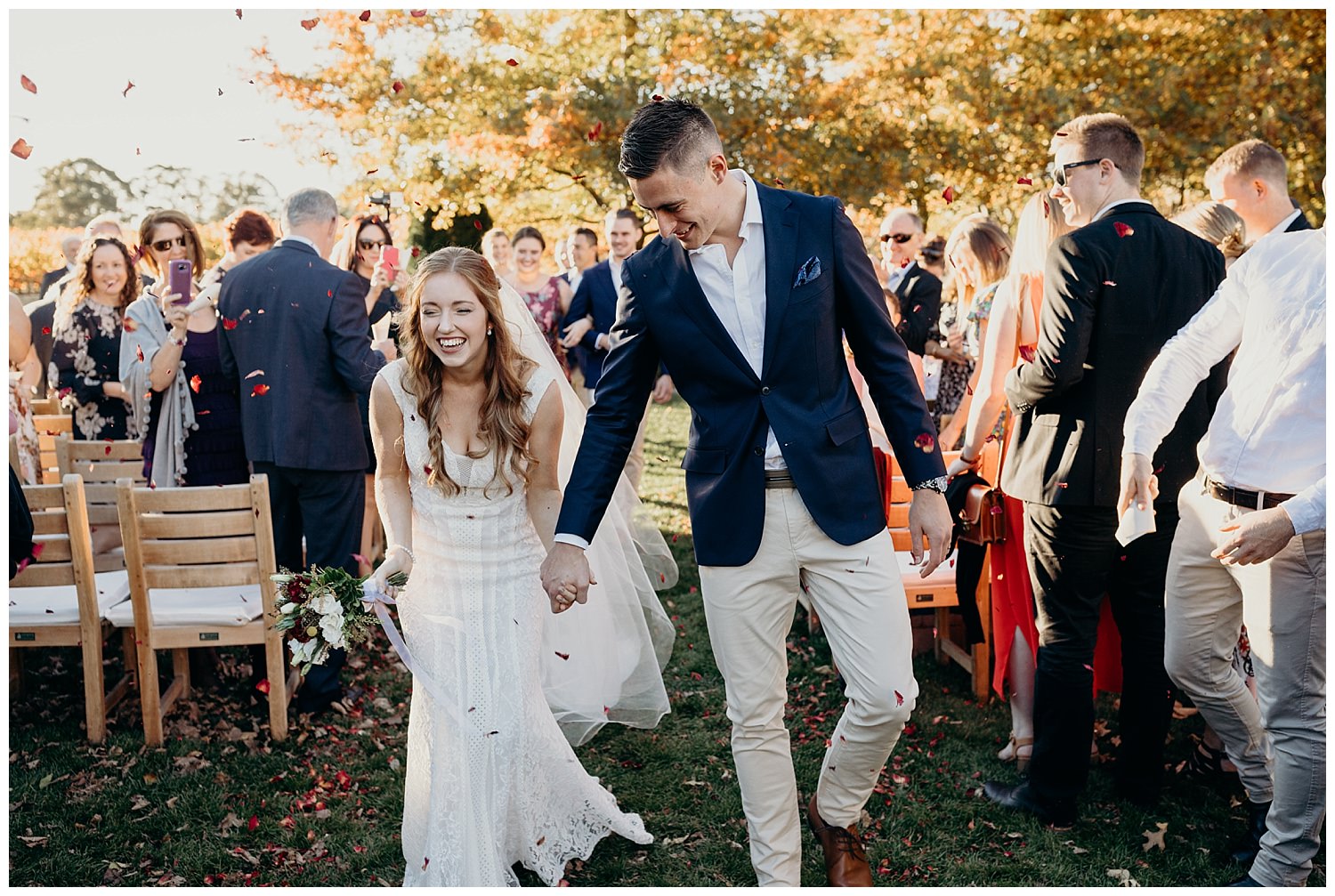 Bowral Southern Highlands Autumn Wedding - Bride and groom showered in confetti
