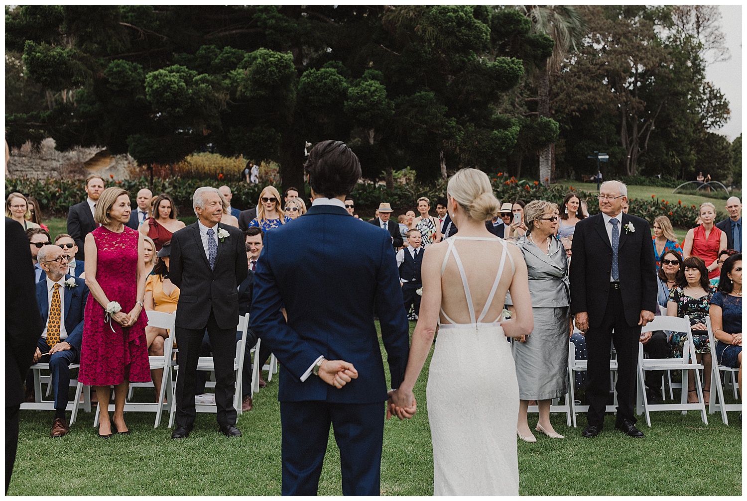 Bride and groom are given away by parents at this Sydney Wedding Ceremony