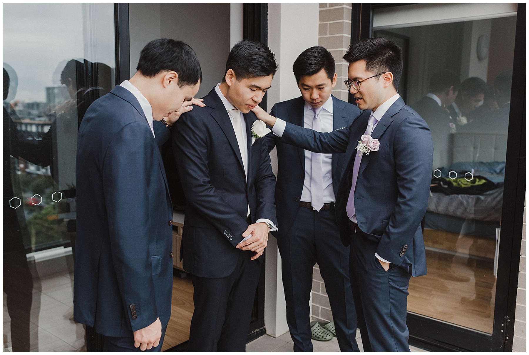 Groom and Groomsmen having a quiet moment