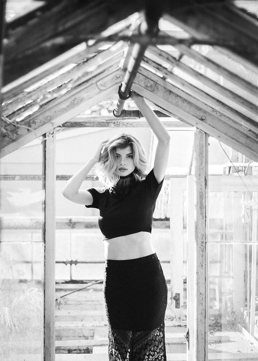 Atlanta-model-Jenna-Schulz-wearing-black-lace-skirt-in-abandoned-greenhouse-by-photographer-Chanel-French.jpg