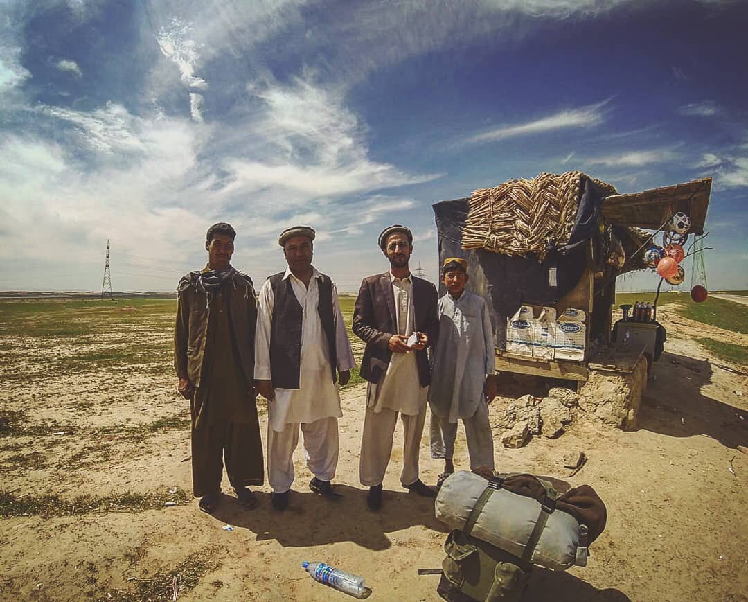 New friends outside a Kiosk on the road, Afghanistan, photo by Arjun Bhogal.jpg