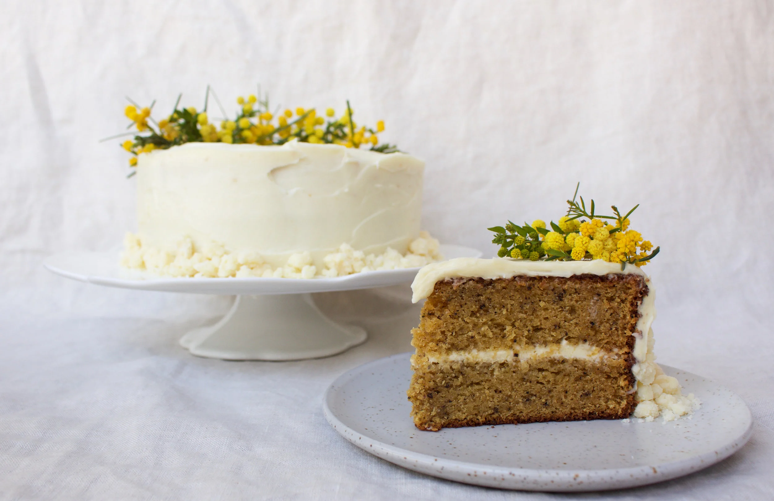 malted wattle seed cake slice and whole.jpg