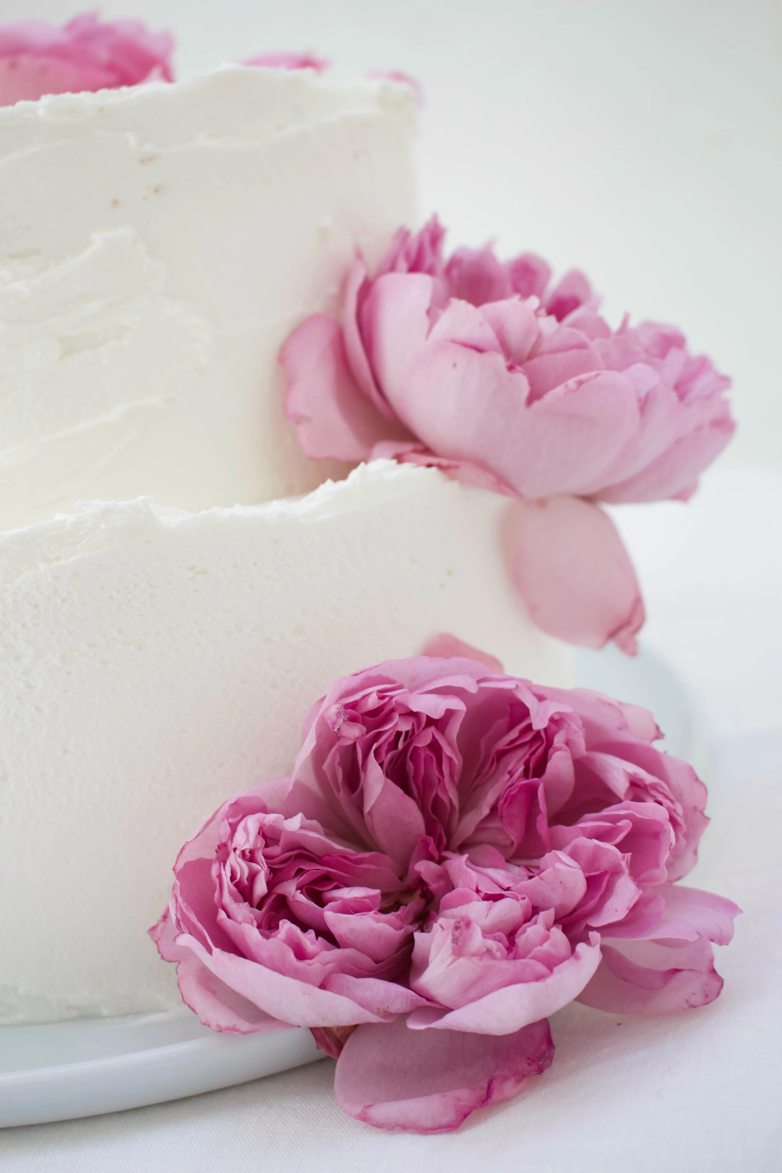 < buttermilk sponge w/ summer berry filling &amp; vanilla frosting  wedding cake >