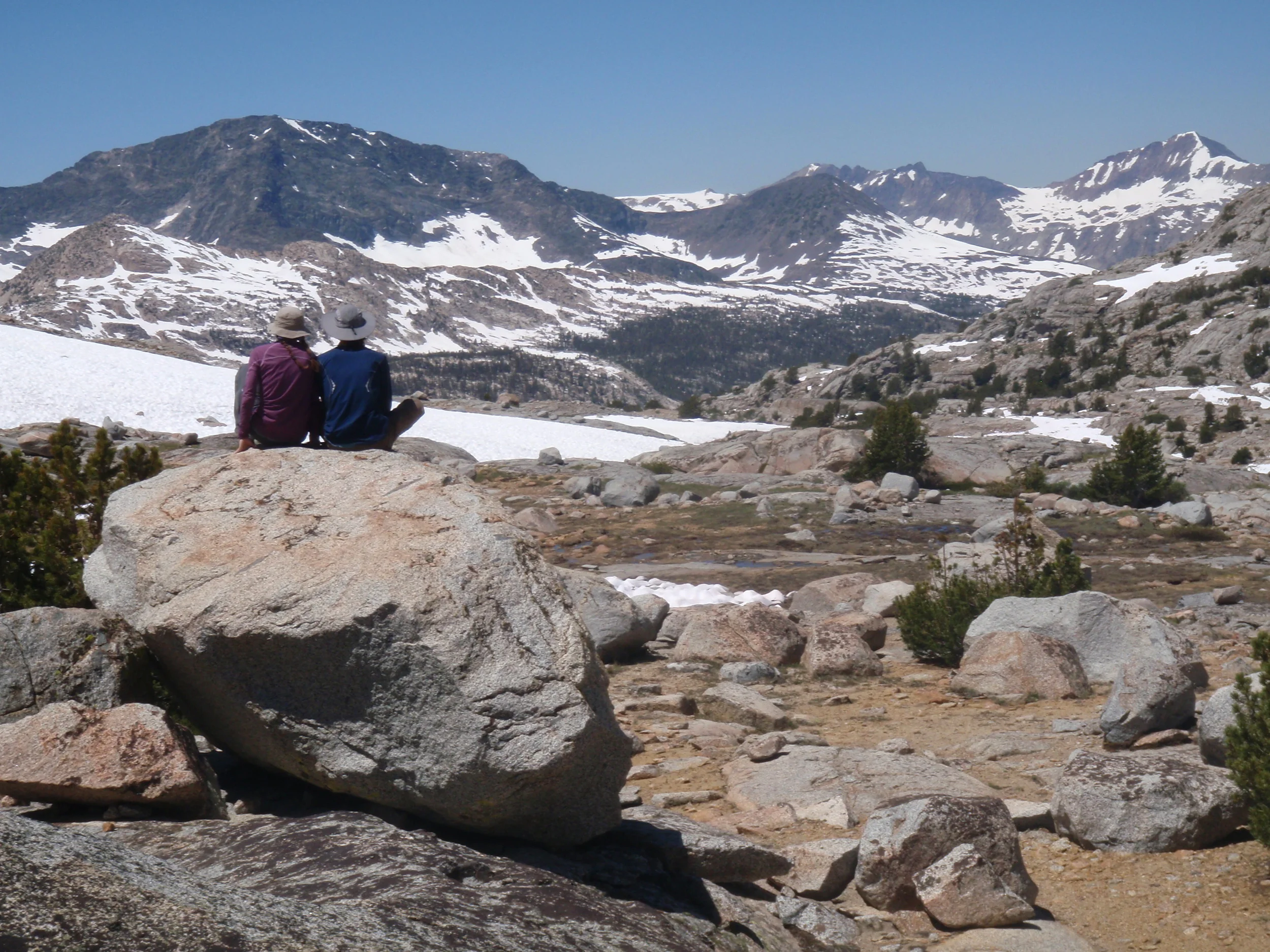 Day 7 CA sitting on boulder looking out towards Emerald Peak from upper Darwin Bench.JPG