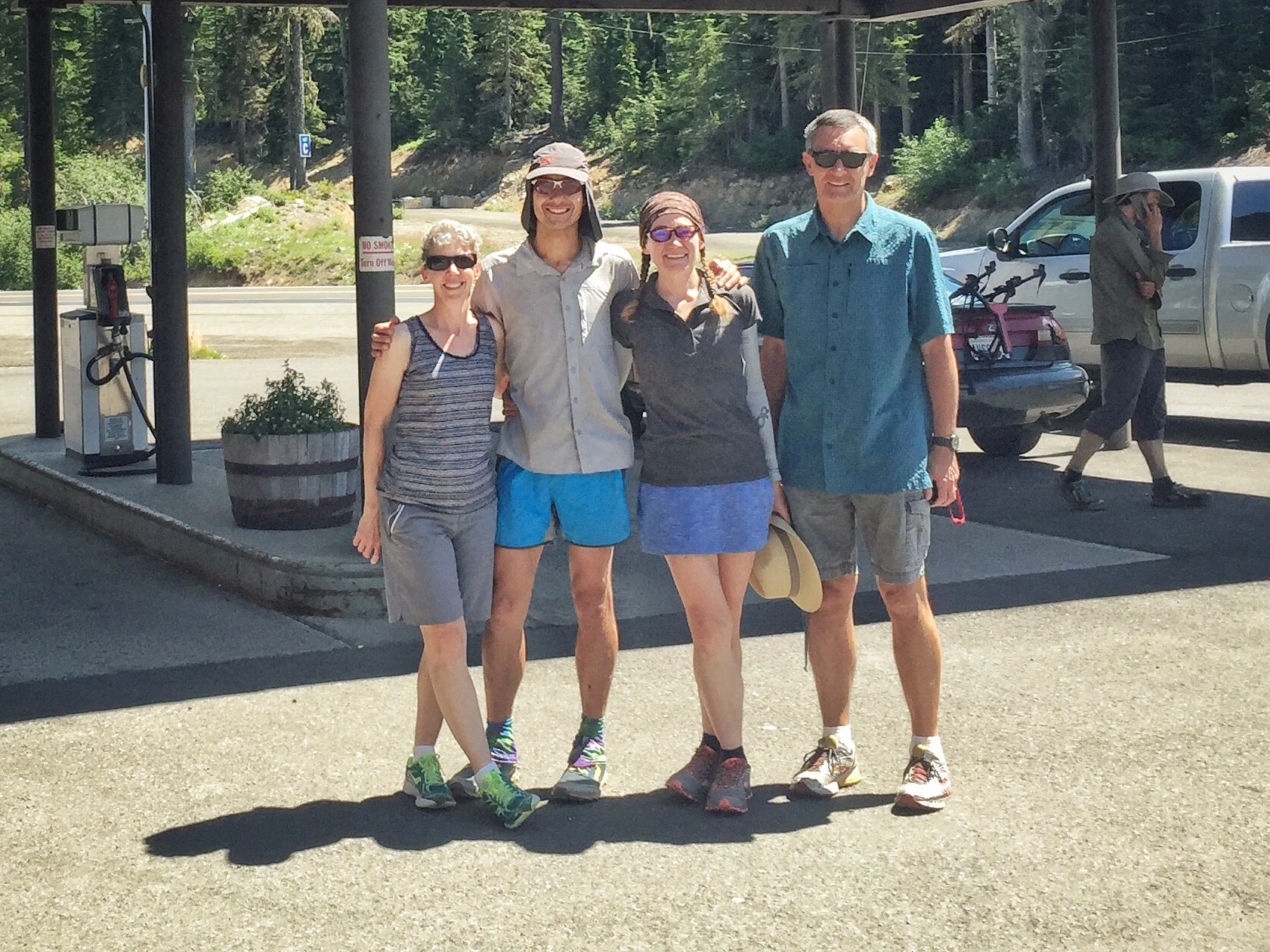 Our rock star White Pass resupply team, known to SOBO hikers as "the fruit people" (& fellow hiker Dustin on his phone in the background)