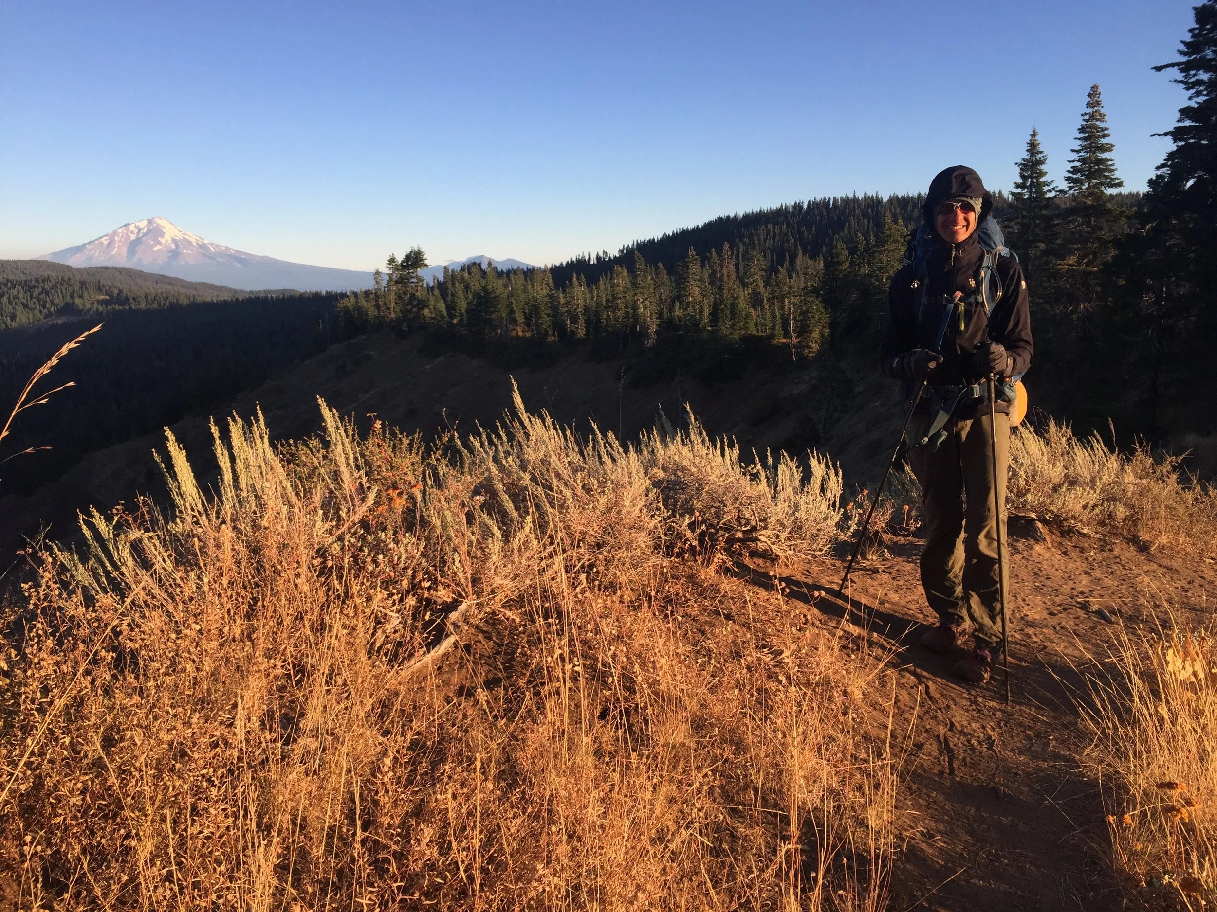 Morning golden hour on our exposed ridge and Mt. Shasta and Macro in layers against the biting wind