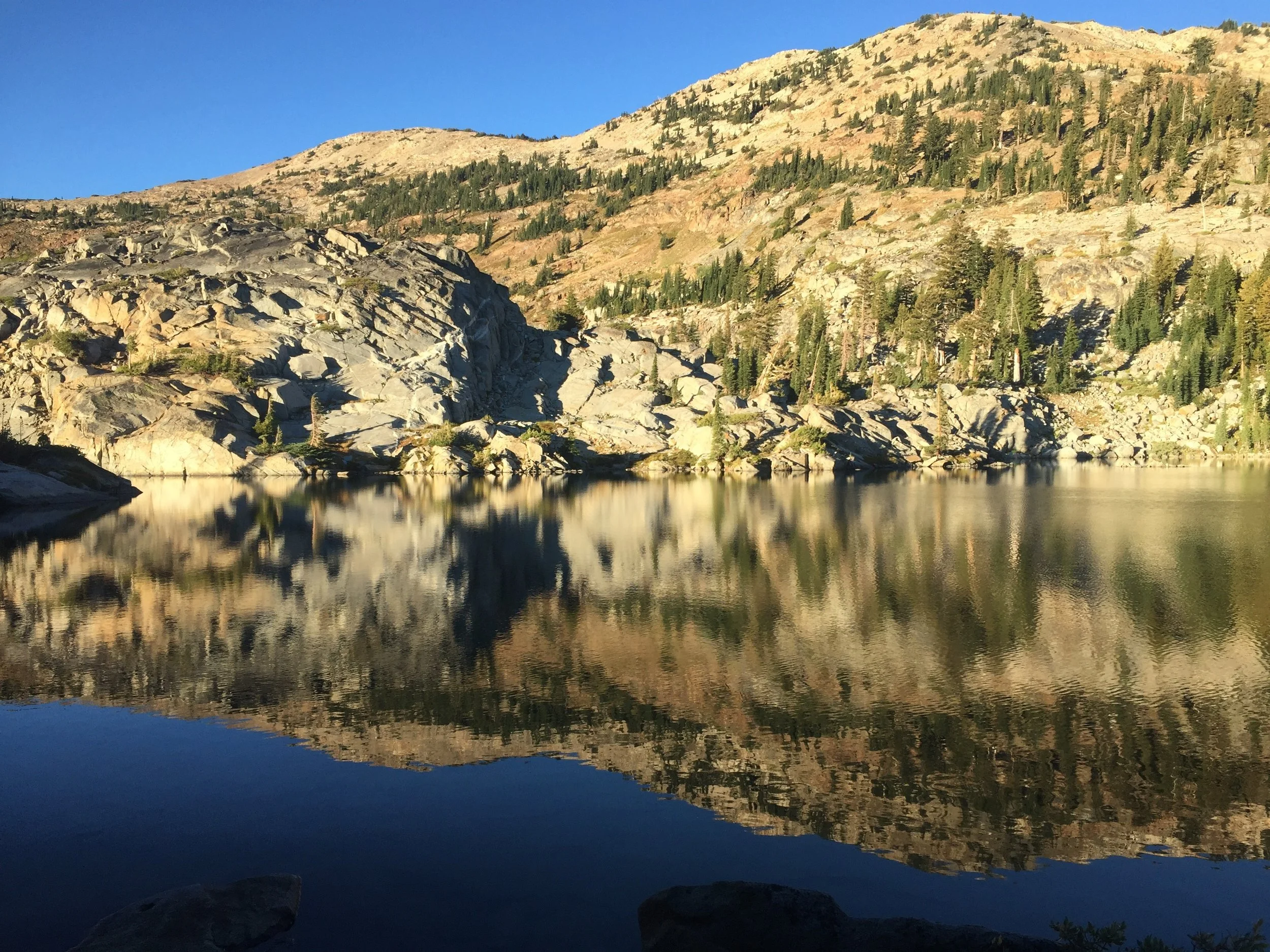 Morning light and reflection in Fontanillis Lake