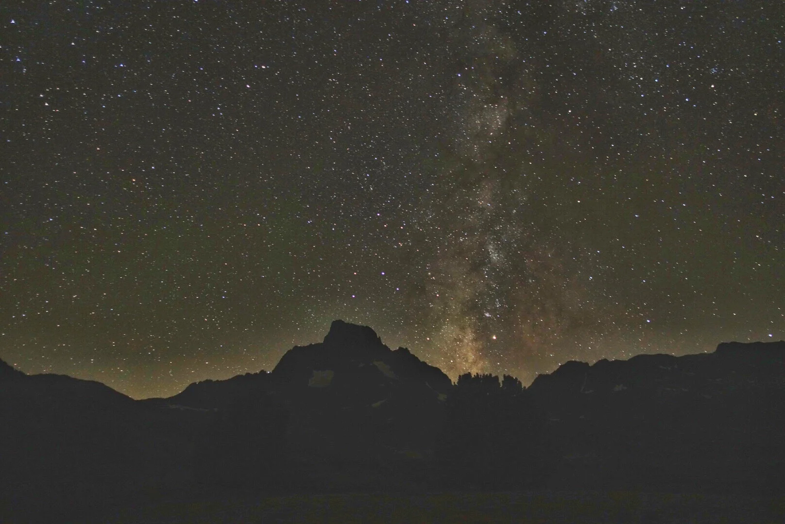 The Milky Way erupting like the Vegas strip above Banner Peak.