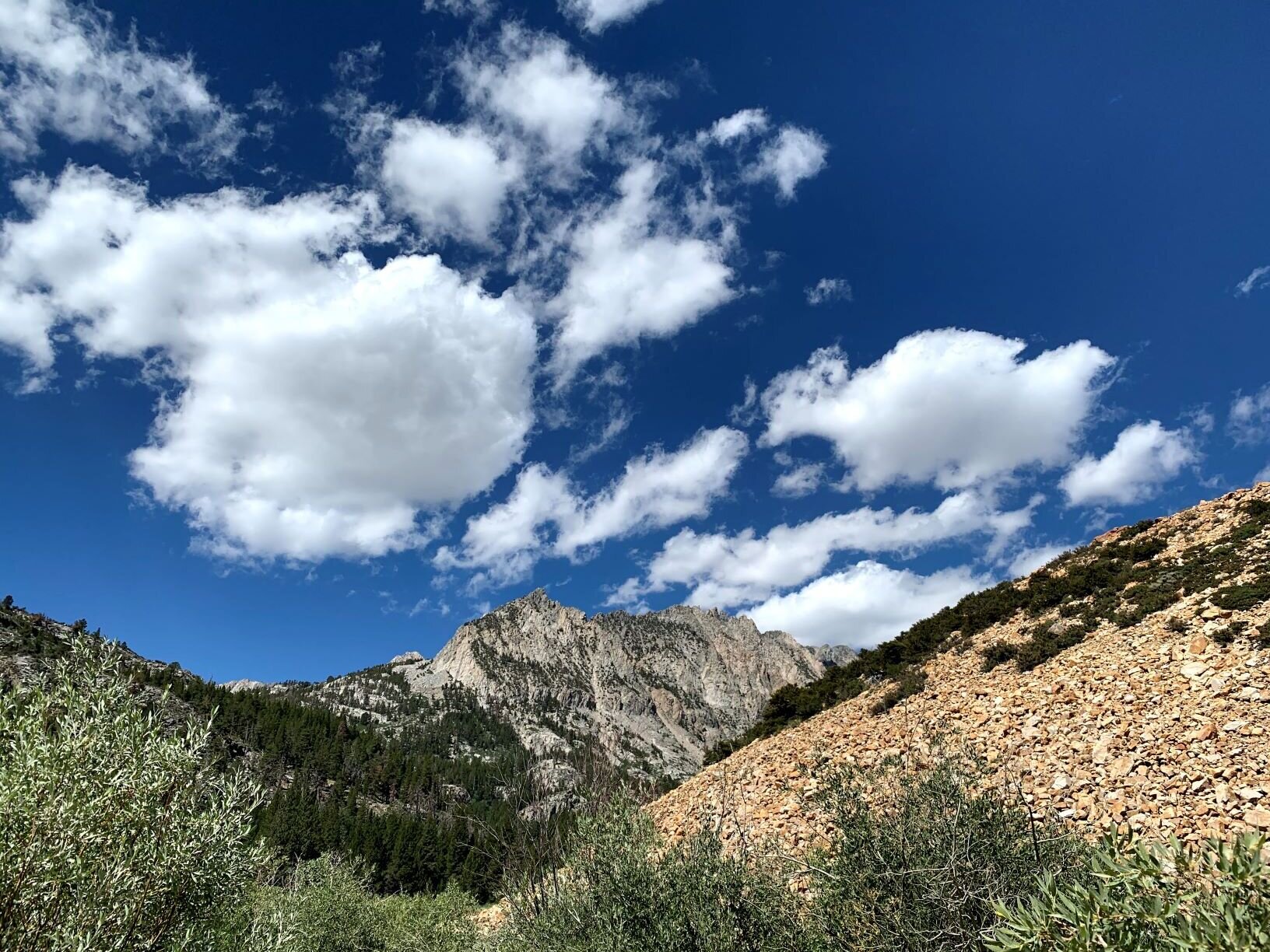 Puffy clouds over PIute Pass near TH.jpg