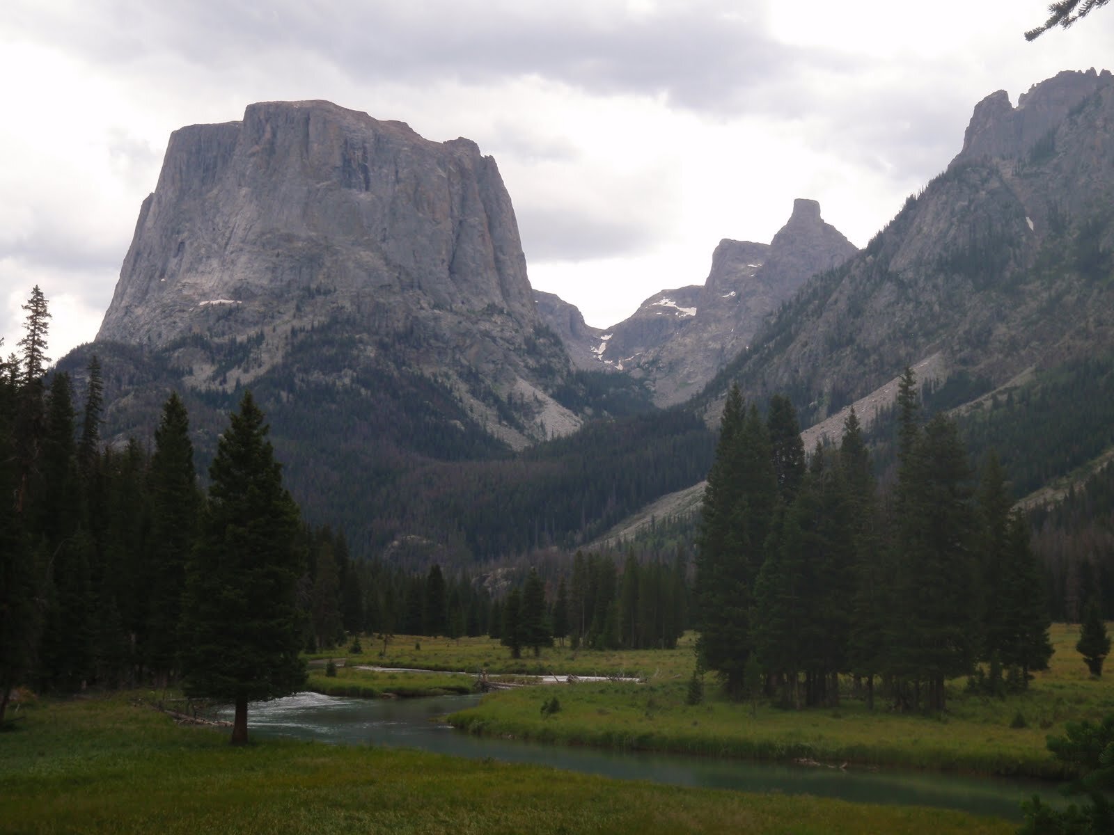 Day 1 Squaretop and the Bottle with Green River through meadow below stormy sky horiz.JPG