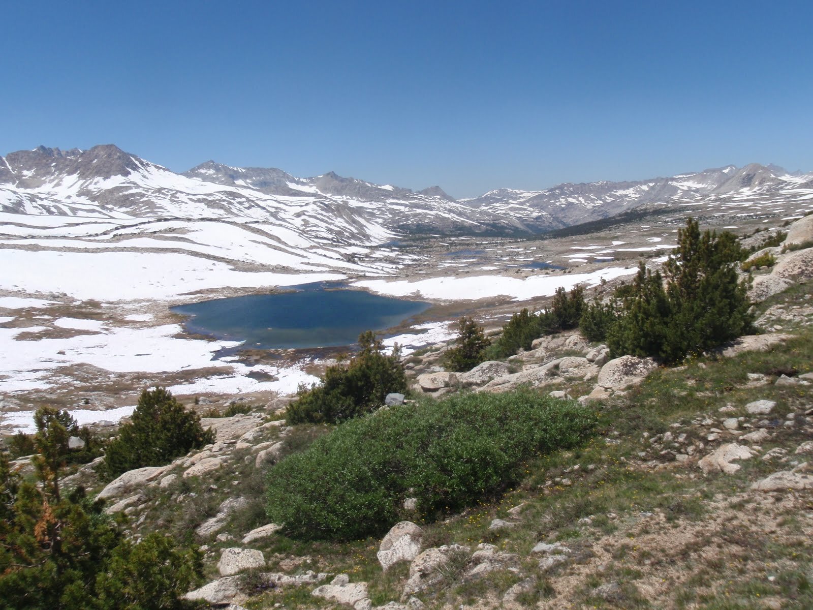 Day 9 Summit Lake thawed and broad view west from above Piute Pass.JPG