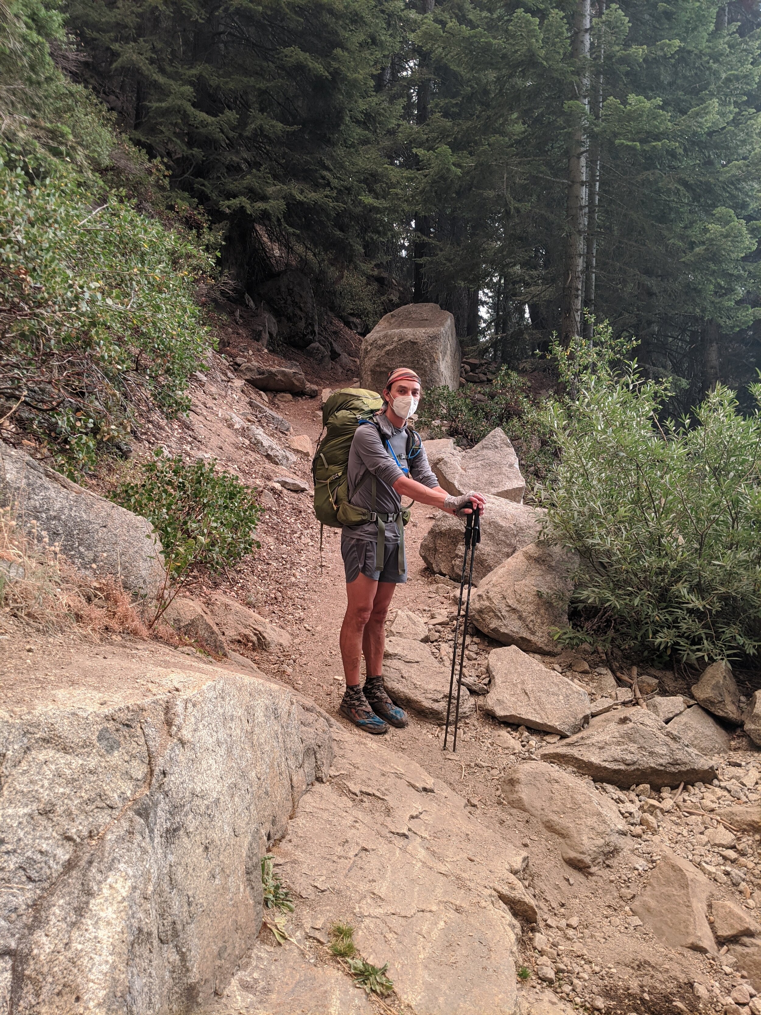 Andrew contemplates masked hiking