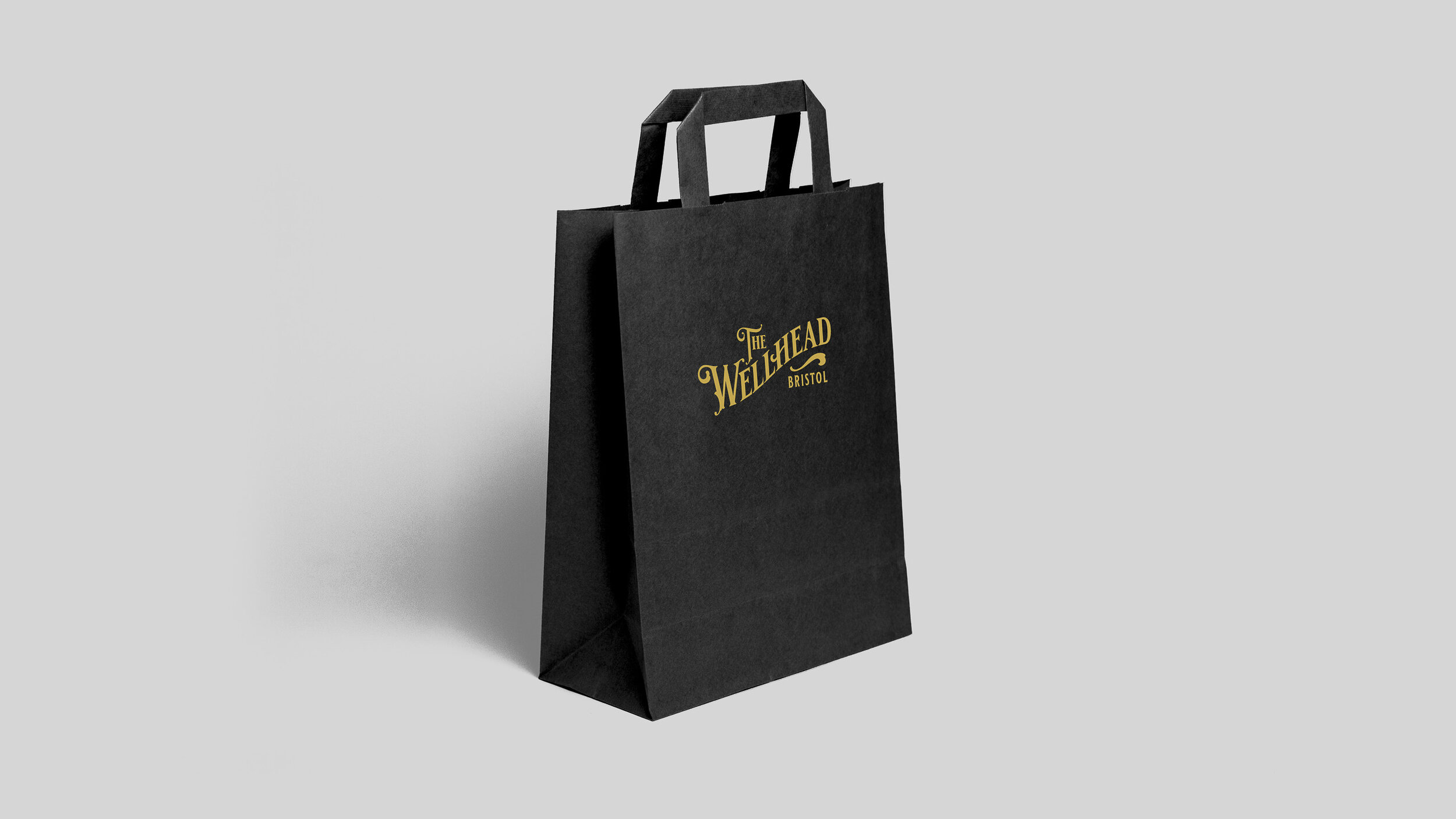 Liqui Group_The Wellhead Bristol_Bag-2-Gold on Black_www.liquidesign.co.uk.JPG