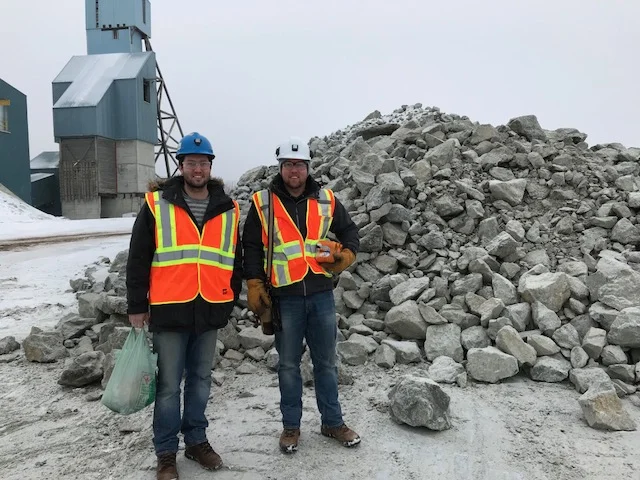 Winston Whymark and Wesley Whymark in front of 1,000 t of Pardo material.