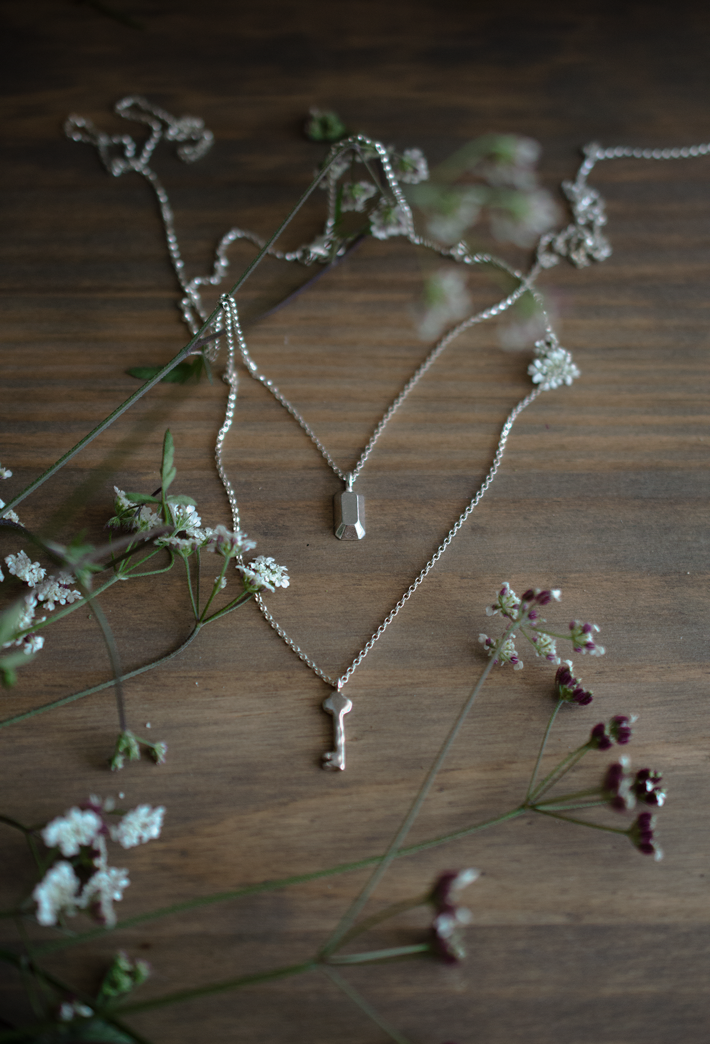 Tiny Key and Emerald Cut Necklace Still Life small.png