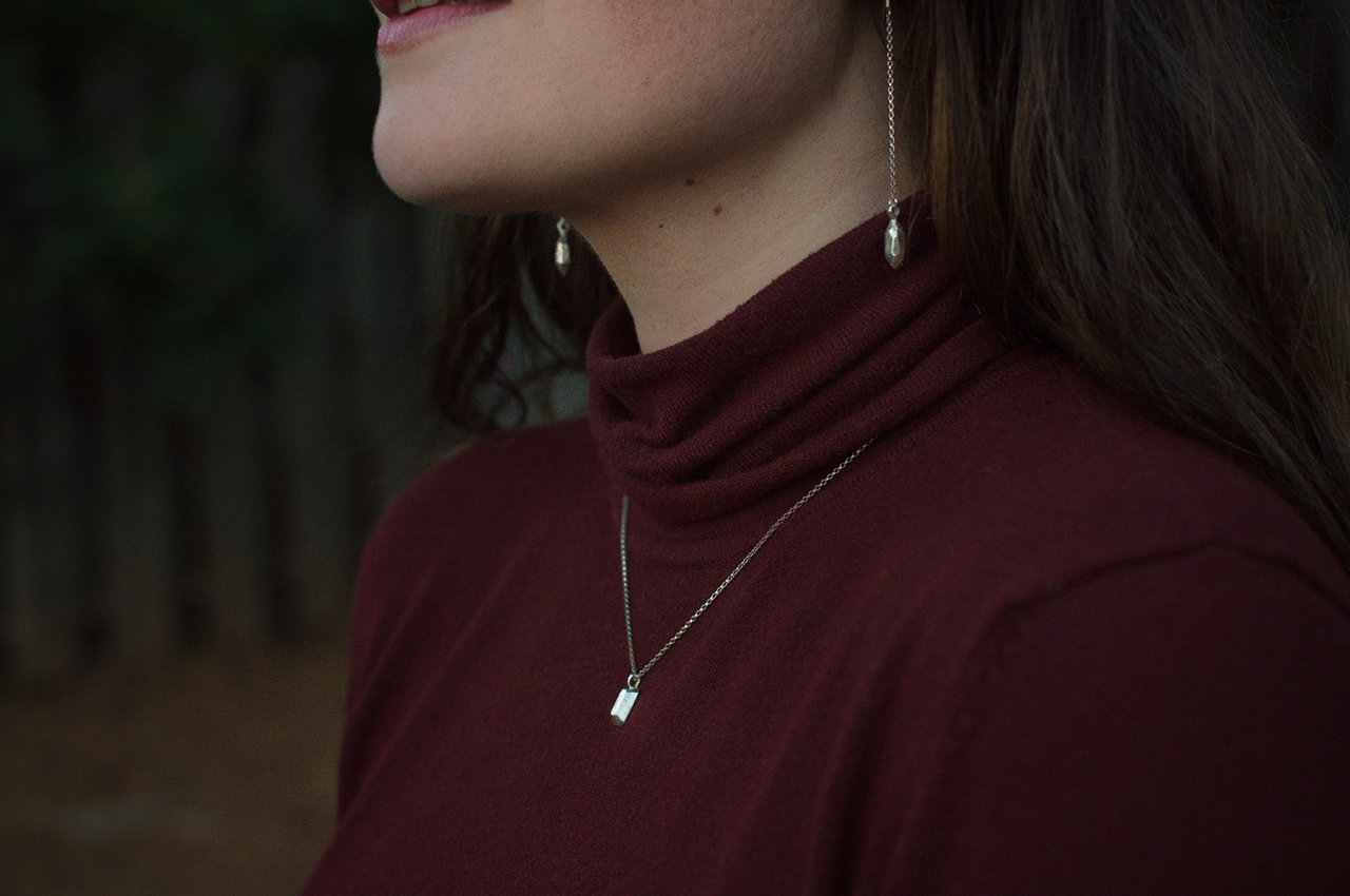 Carissa Emerald Cut Necklace Side View small.png