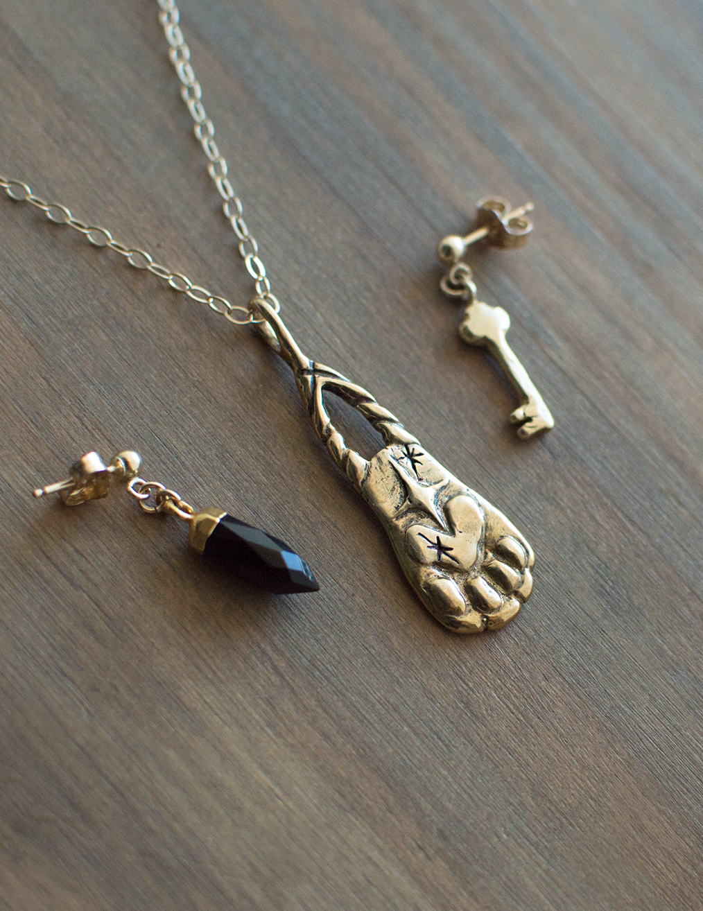 Paw of Magic, Onyx and Key Post Earrings by Good Looking Objects.png