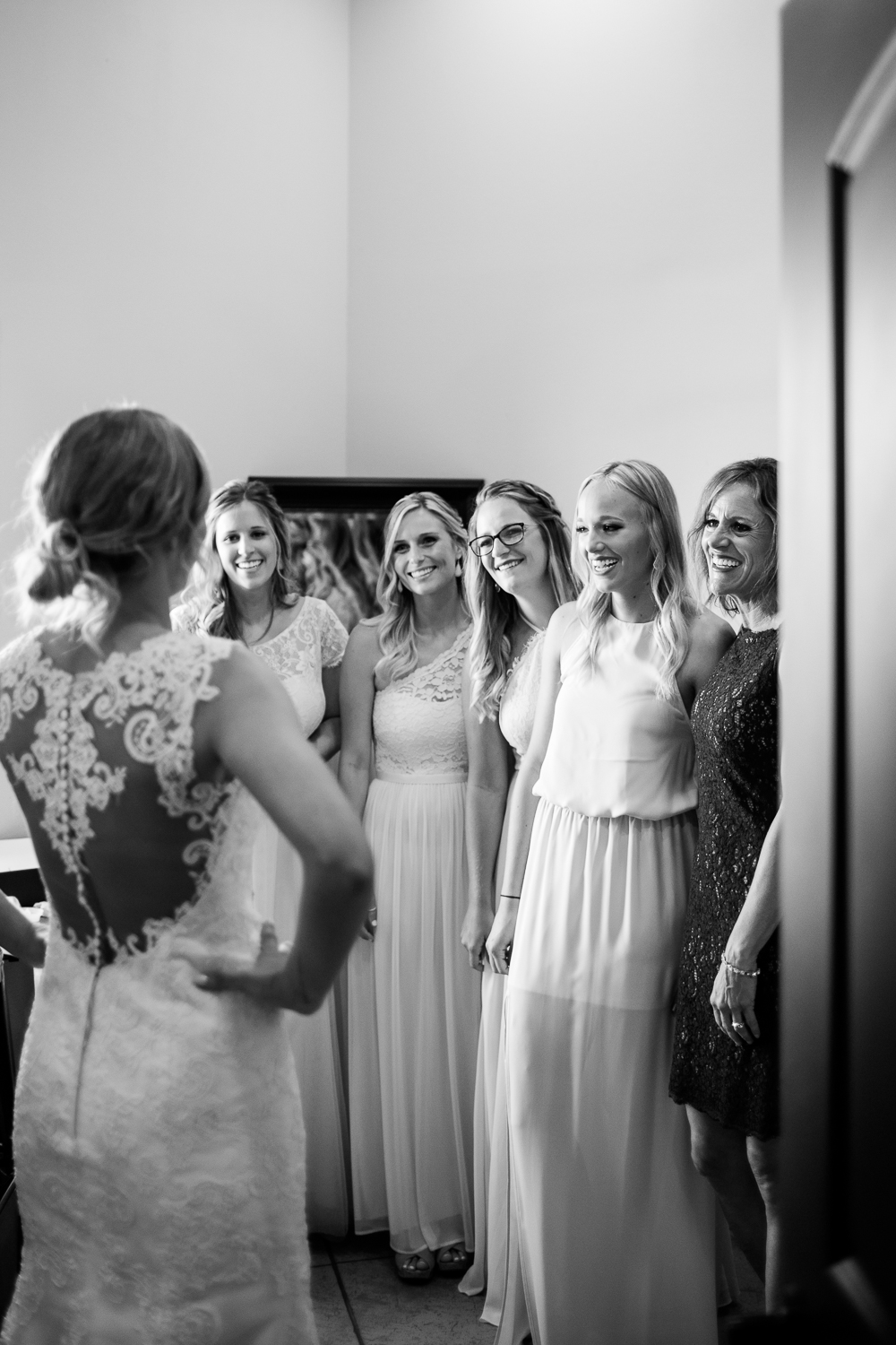bride doing first look with her bridesmaids