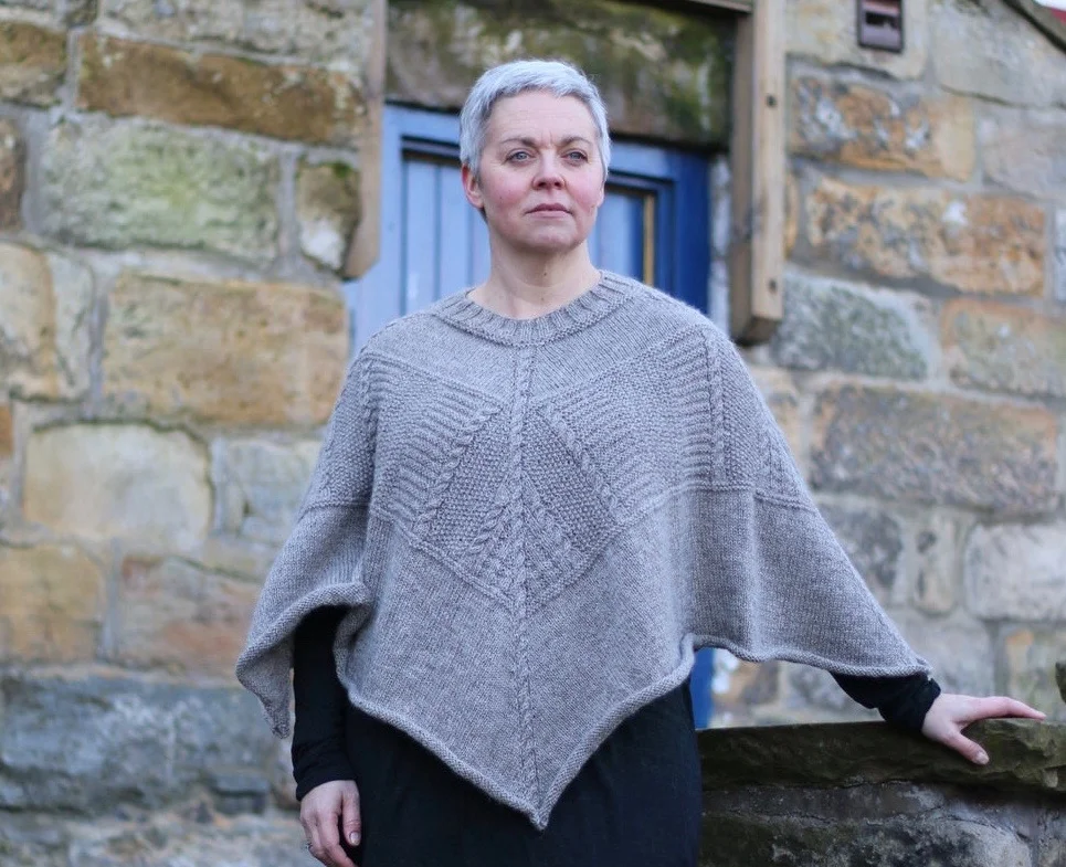 Saltwick Bay poncho This cosy poncho combines traditional motifs from three gansey locations Yarn: Dovestone DK (252 yds / 230m in 100g) Yarn Quantities: 1258 yards (1150 m) Needles: 4mm circular 80-150cm lengths, 3.5mm x 60-80cm circular and DPNs Notions: cable needle, stitch markers Size: one size - hem circumference 165cm/65", Length 51cm/20"